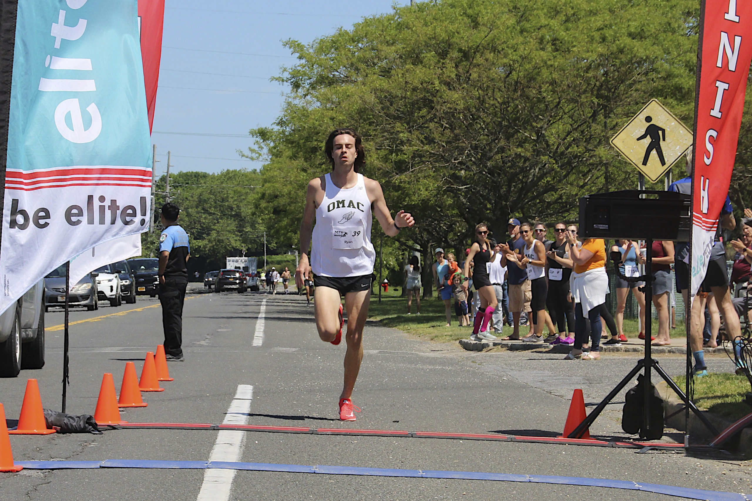 Montauk Mile Men’s winner Ryan Fowkes.  KYRIL BROMLEY