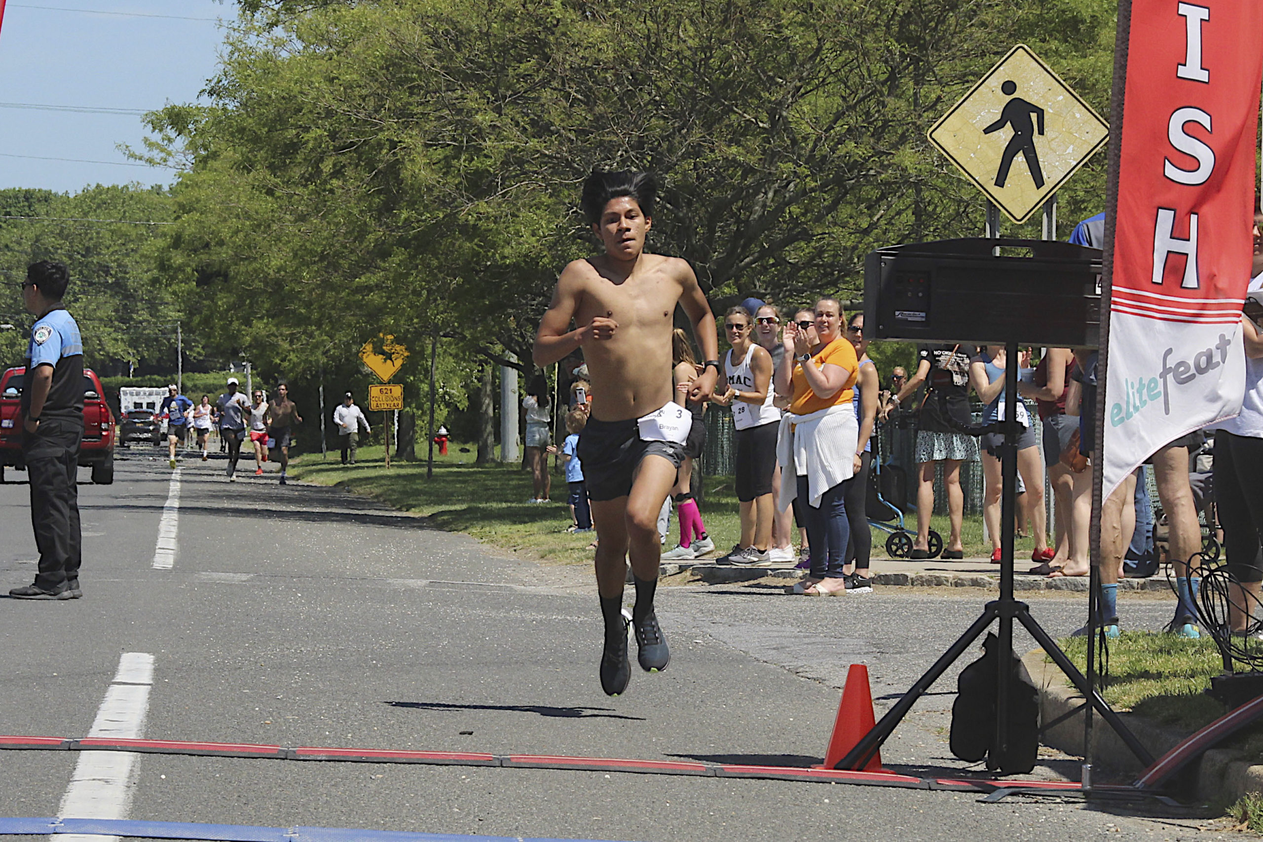 Montauk Mile Men's second place Bryan Rivera.  KYRIL BROMLEY