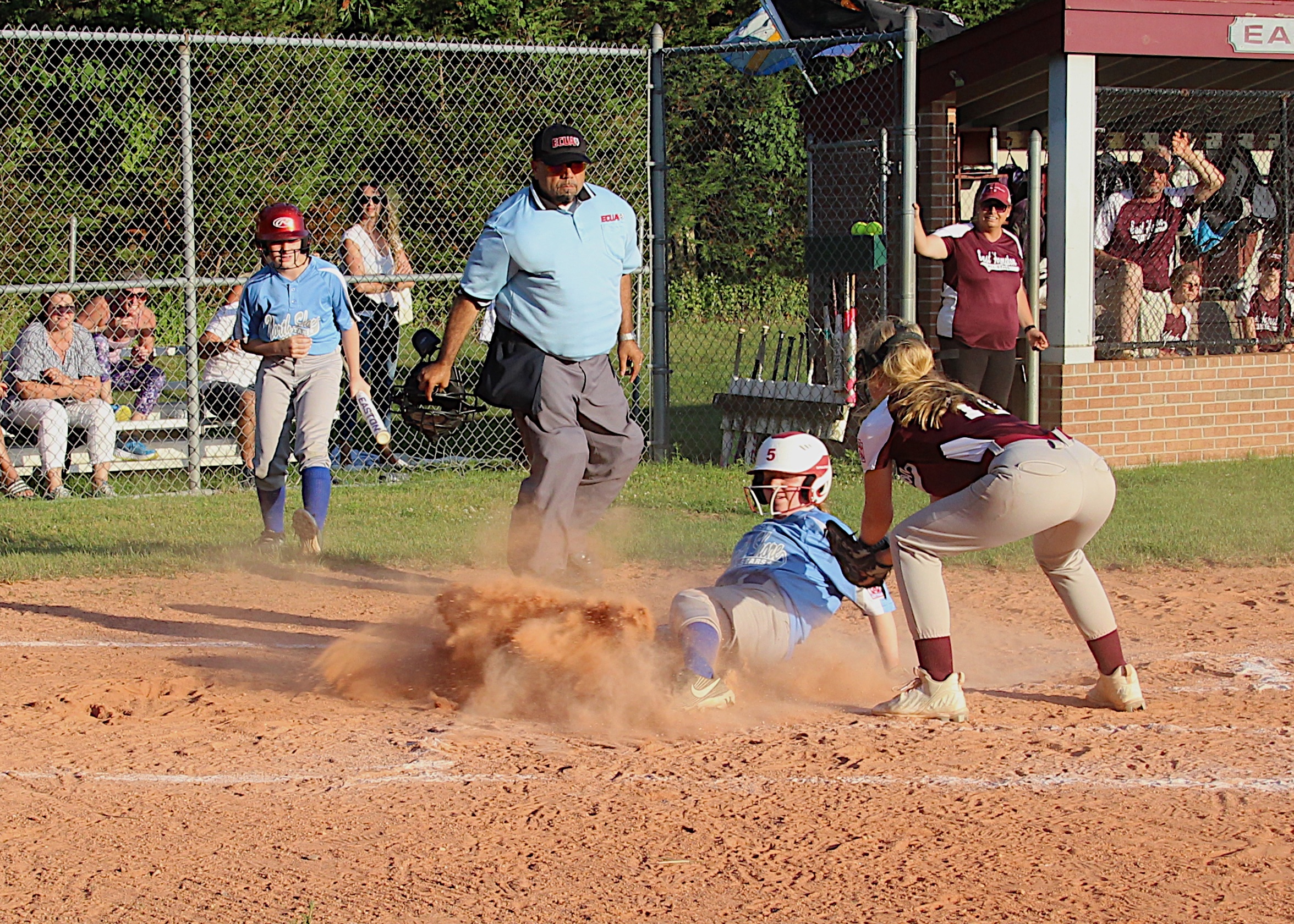Lydia Rowan tries to tag out a North Shore player attempting to score.