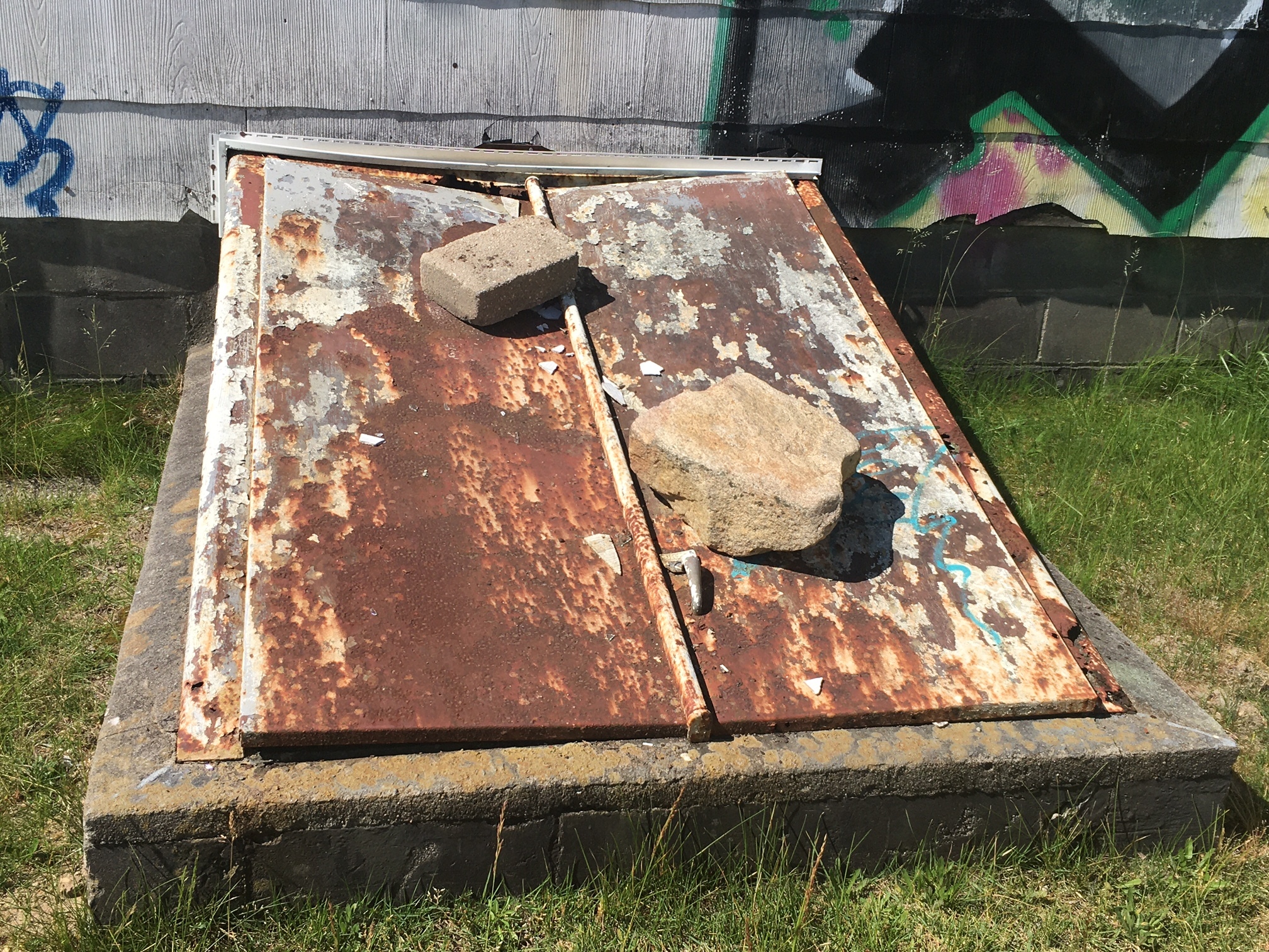 Rusted Bilco doors 'secured
