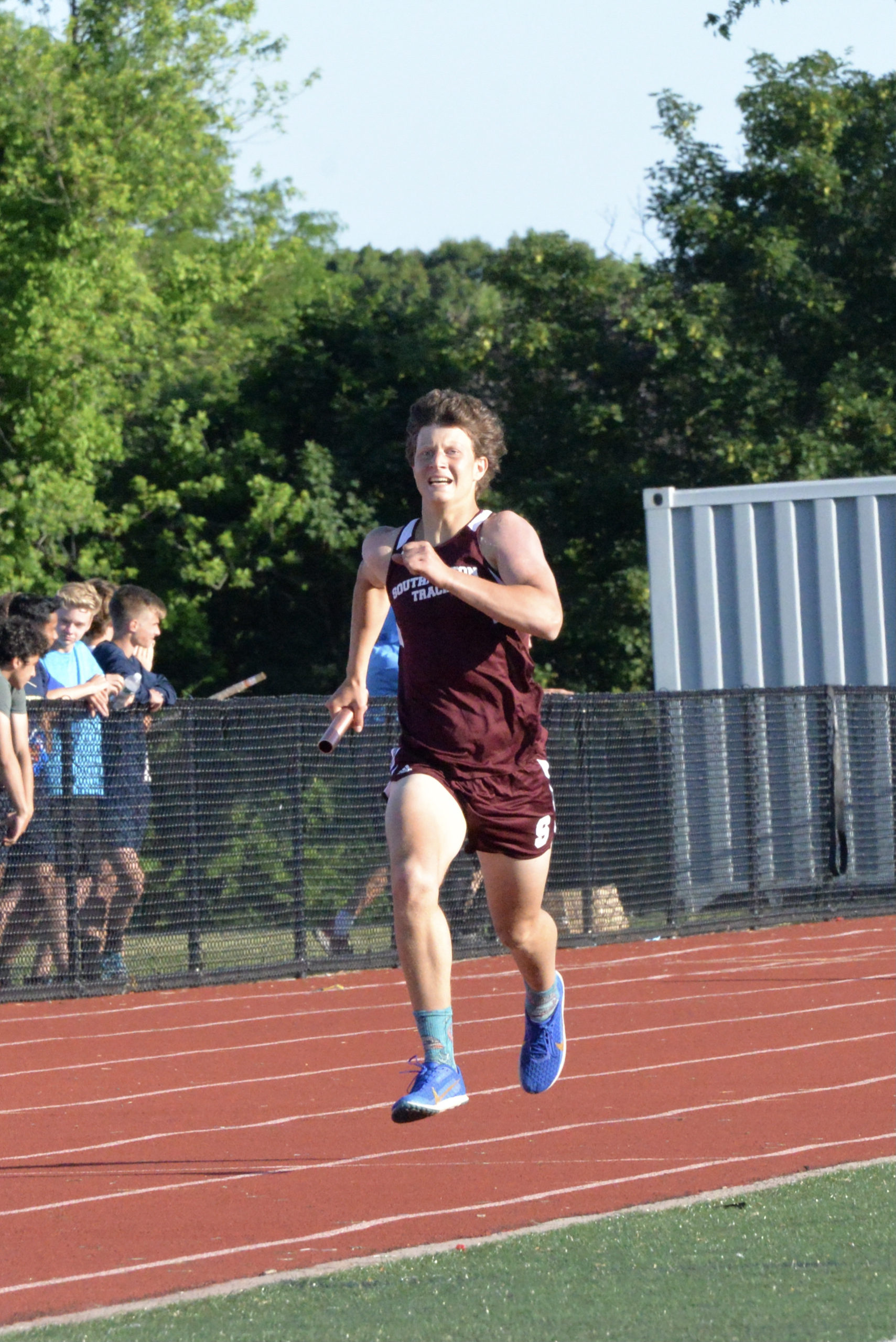 Griffin Schwartz competing in the 4x400-meter relay for the Mariners.