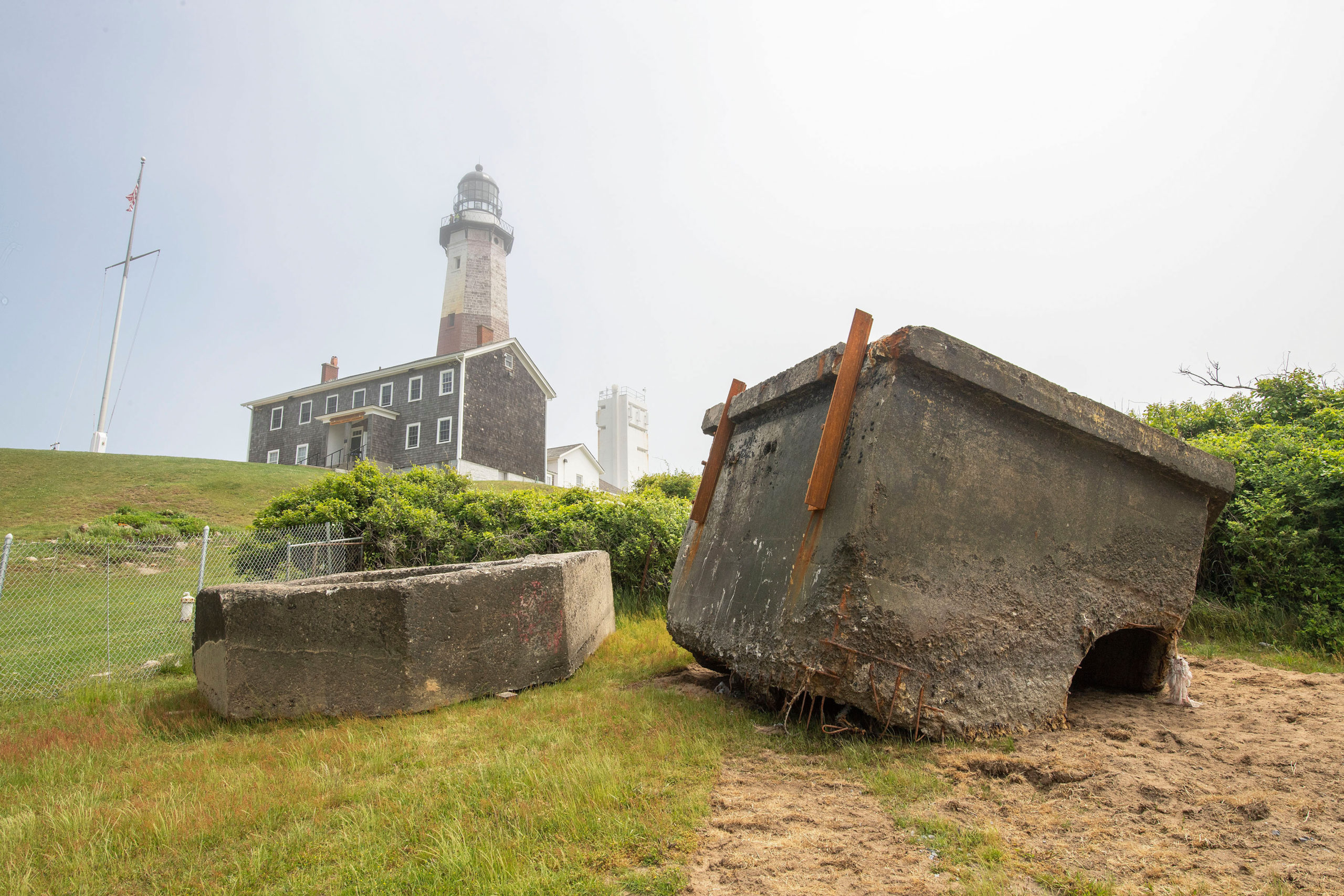 The remains of a World War II bunker was removed off the south-facing beach at Montauk Point as part of the Army Corps of Engineers' Montauk Point Revetment Project on Monday.  MICHAEL HELLER