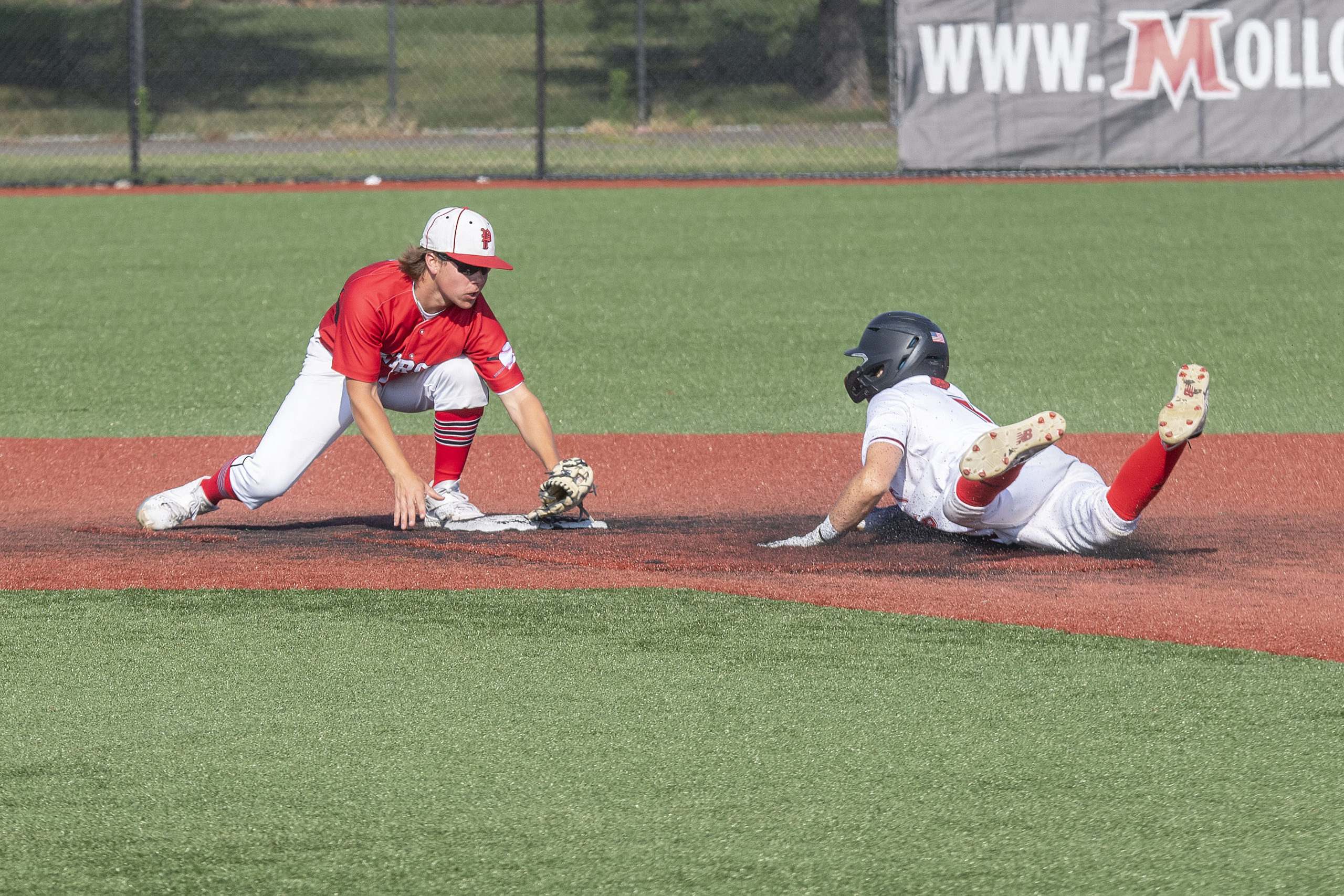 Whaler Christian Pantina thwarts an attempt to steal second base after receiving a throw from catcher Tucker Schiavoni.