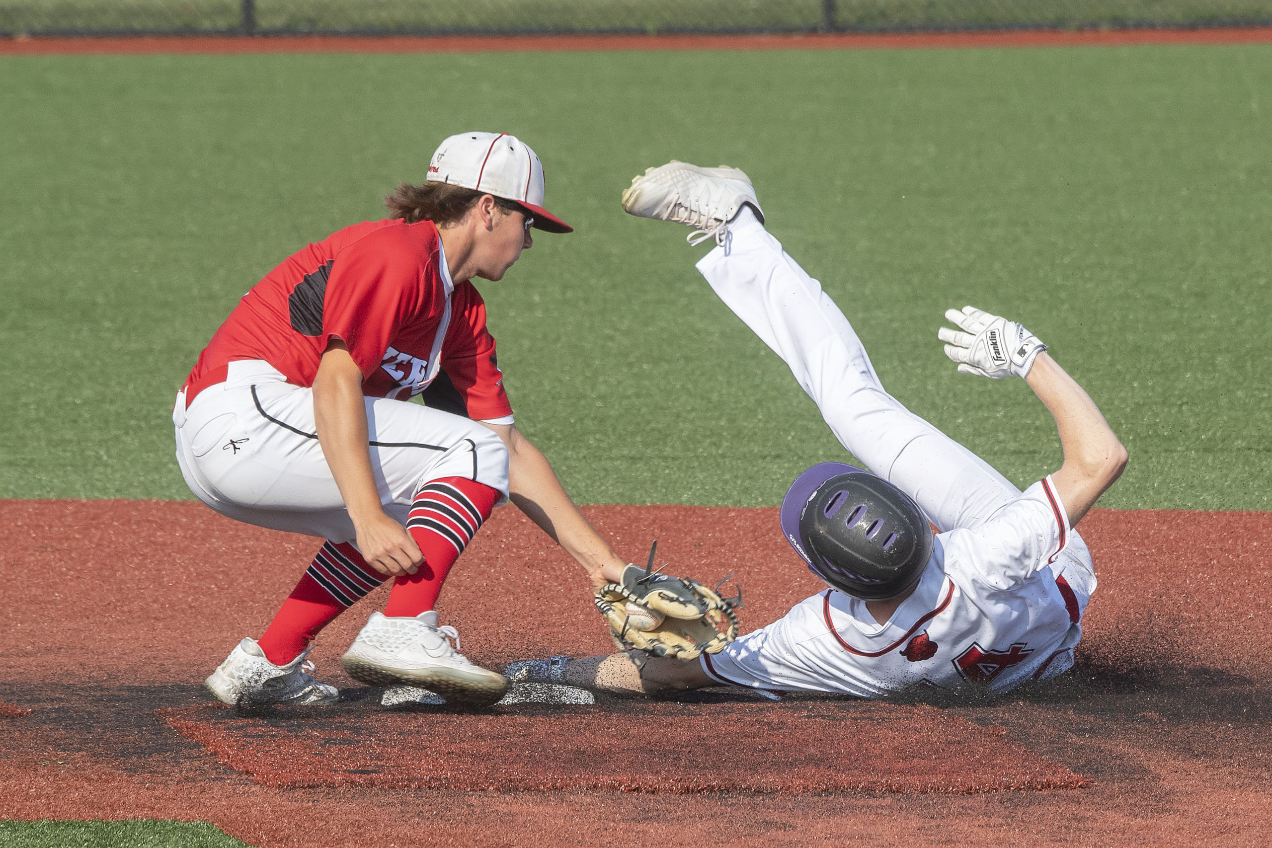 Pierson's Christian Pantina goes to tag out a runner trying to steal second base.
