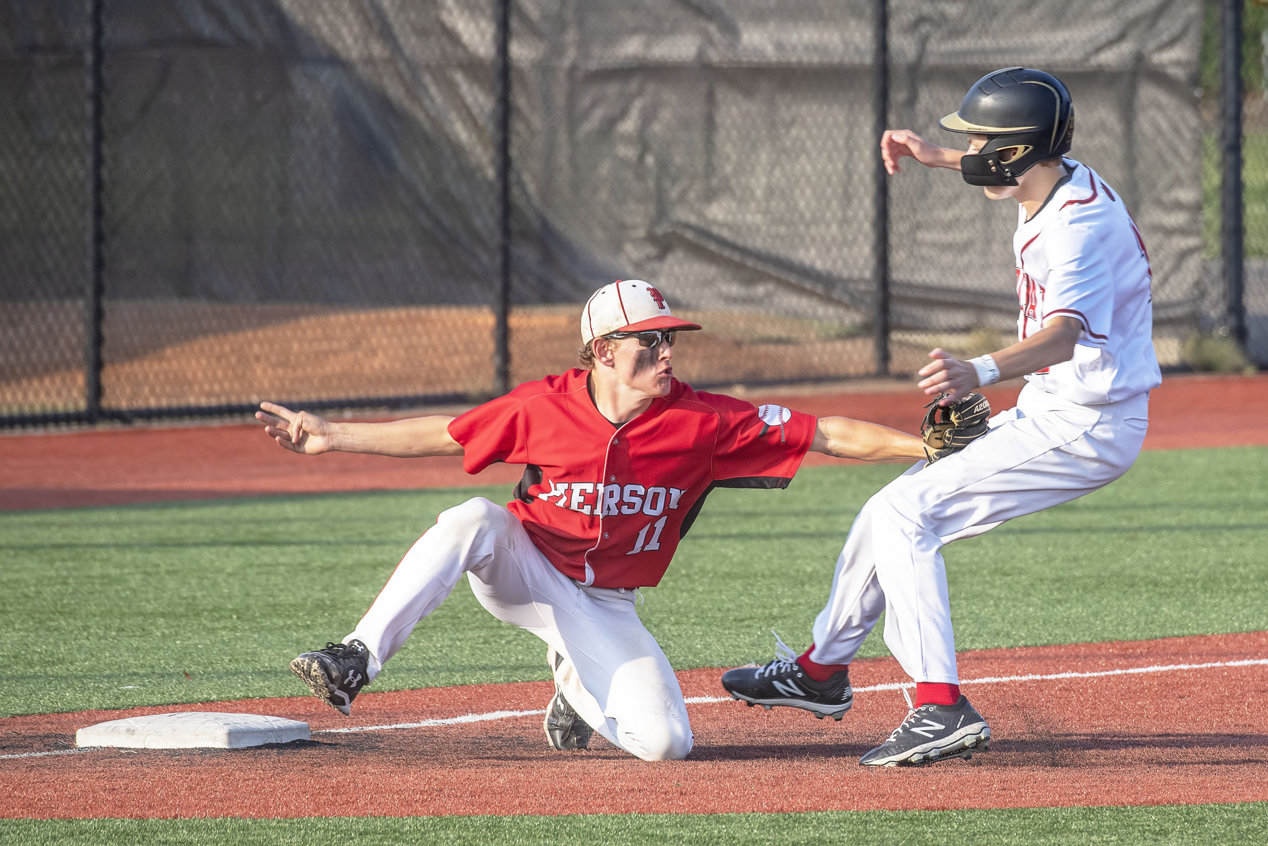 Pierson's Gavin Gilbride tags a runner out at third.