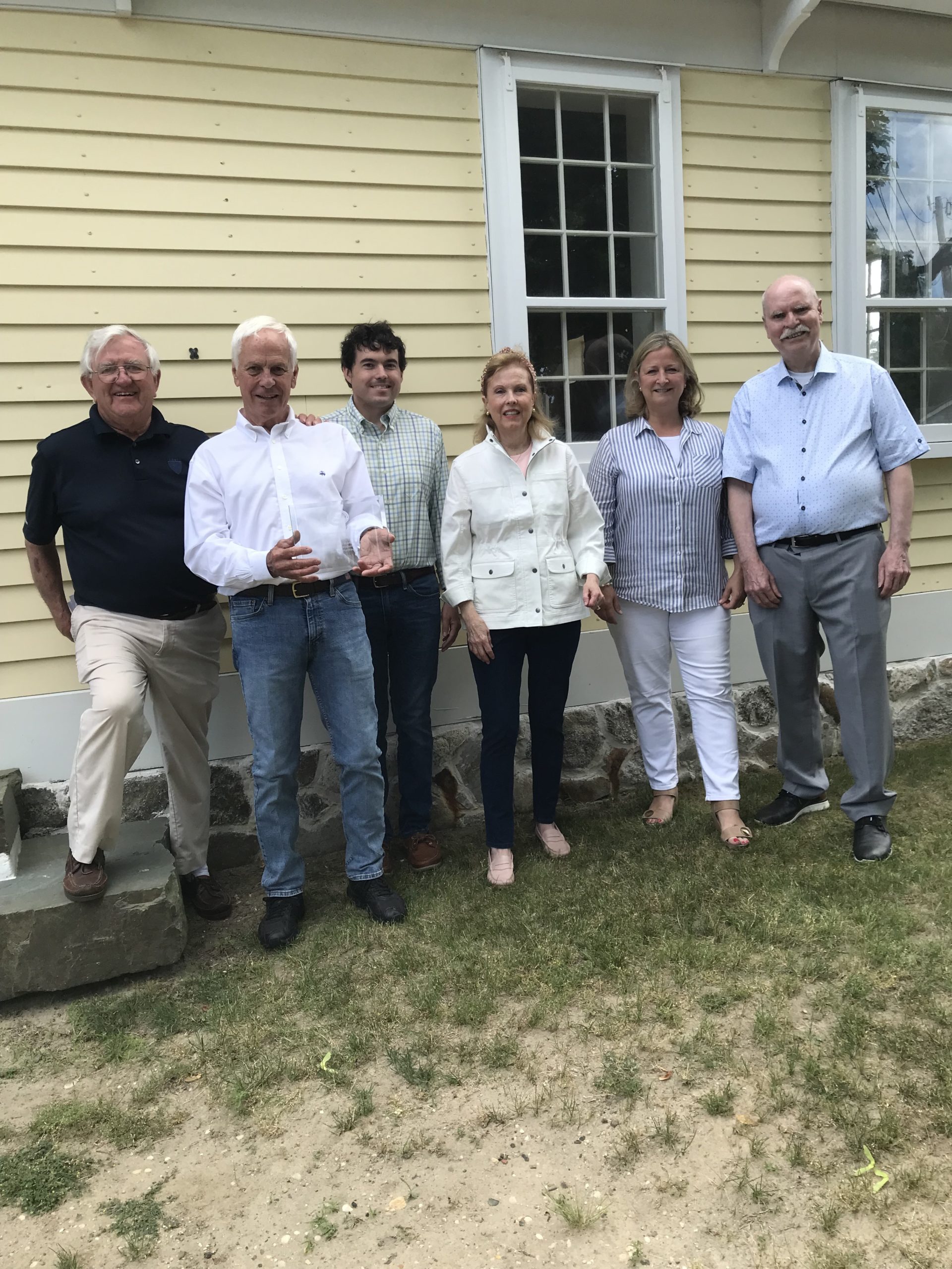 Robert Murray, Larry Jones, Evan Robinson, Maureen Jones, Westhampton Beach Mayor Maria Z. Moore, and Bo Bishop at a ceremony honoring Mr. Jones, a Westhampton Beach resident, for his historic preservation work. The award was given by the Westhampton Beach Historical Society.