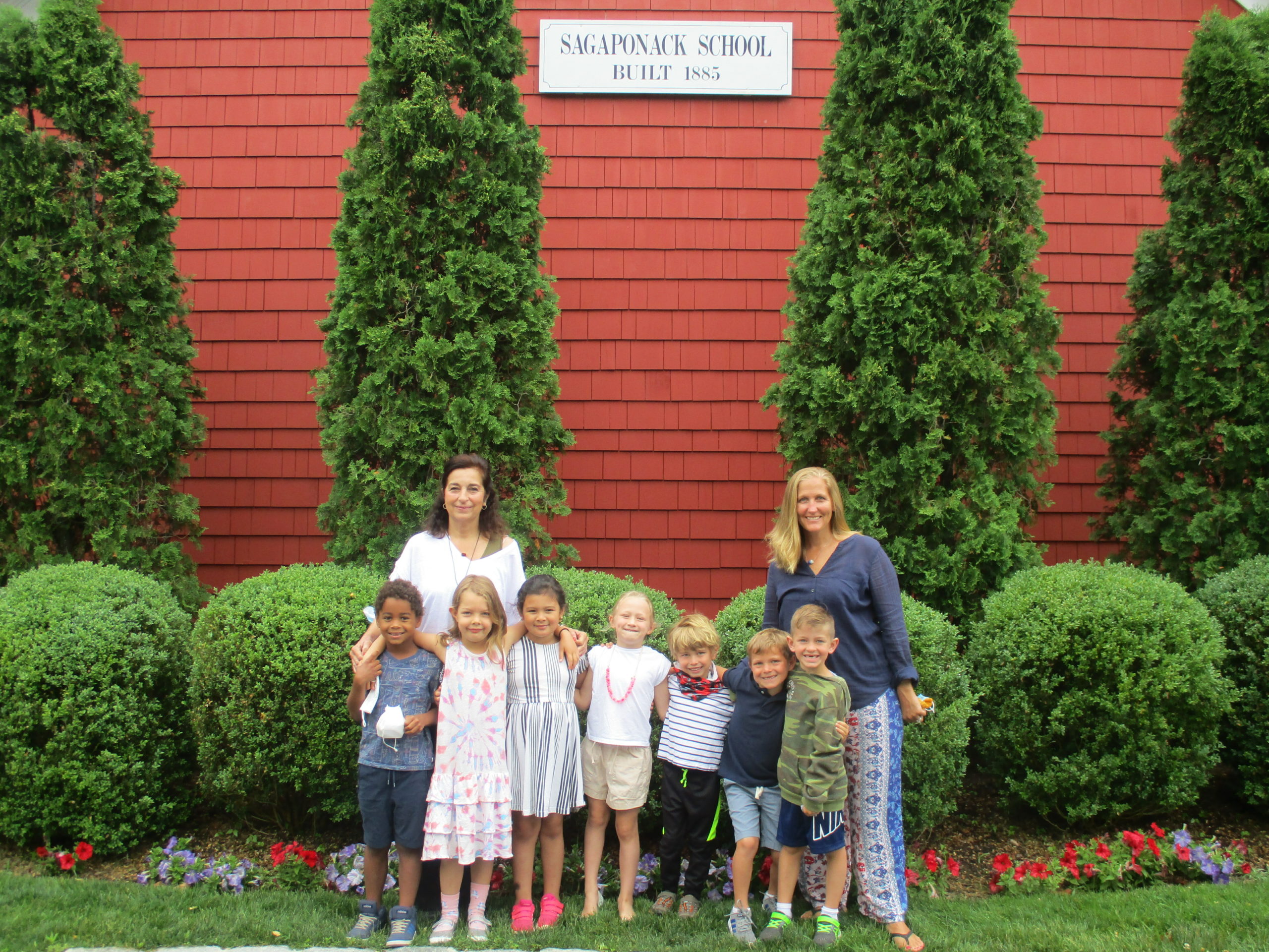 The kindergarten and first grade students at the Sagaponack School with teaching aid Mrs. Velasquez and teacher Mrs. Lombardo celebrated the last day of school with a class picture.