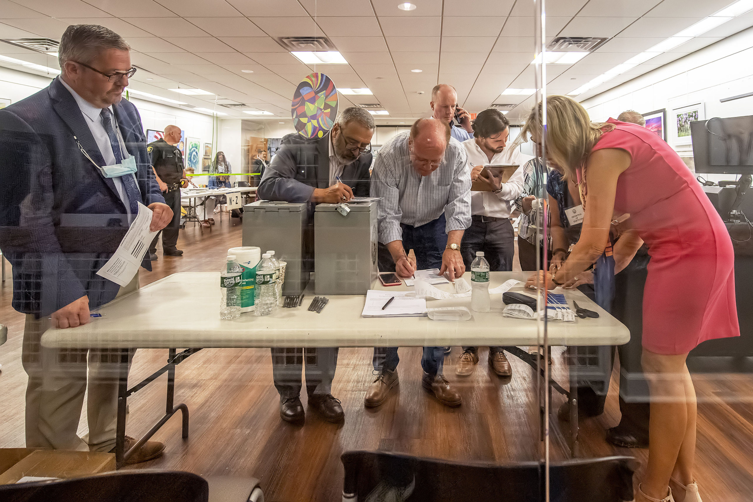 The vote count from each of the voting machines is tabulated during the 2021 Southampton Village Mayoral election at the Southampton Cultural Center on Friday night. MICHAEL HELLER