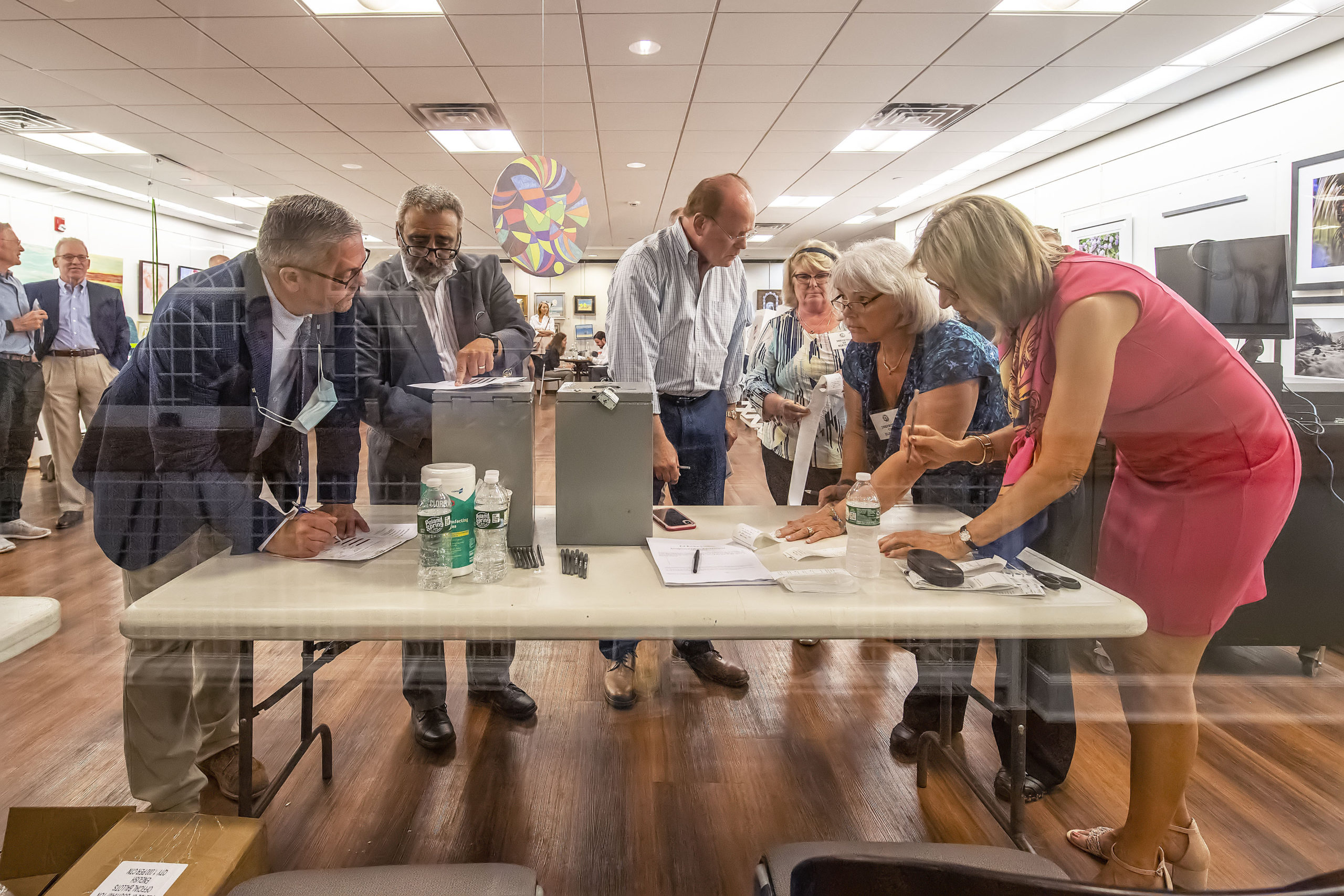 The vote count from each of the voting machines is tabulated during the 2021 Southampton Village Mayoral election at the Southampton Cultural Center on Friday night. MICHALE HELLER