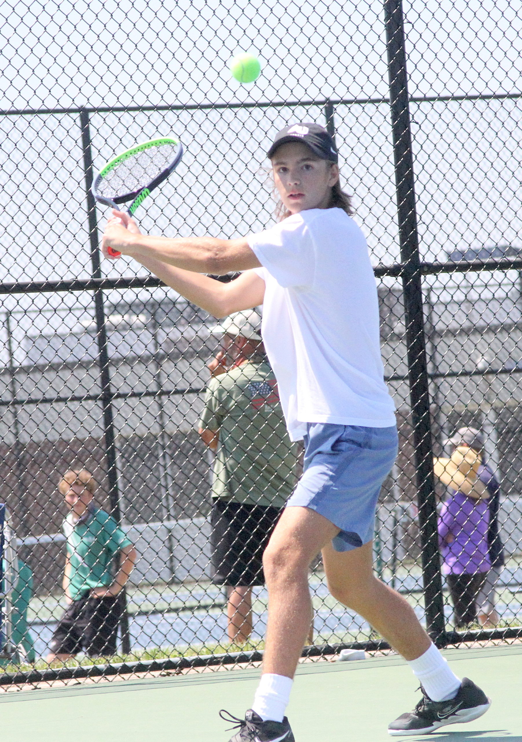 East Hampton sophomore Max Astilean returns the ball in his Division IV quarterfinals match. DESIRÉE KEEGAN
