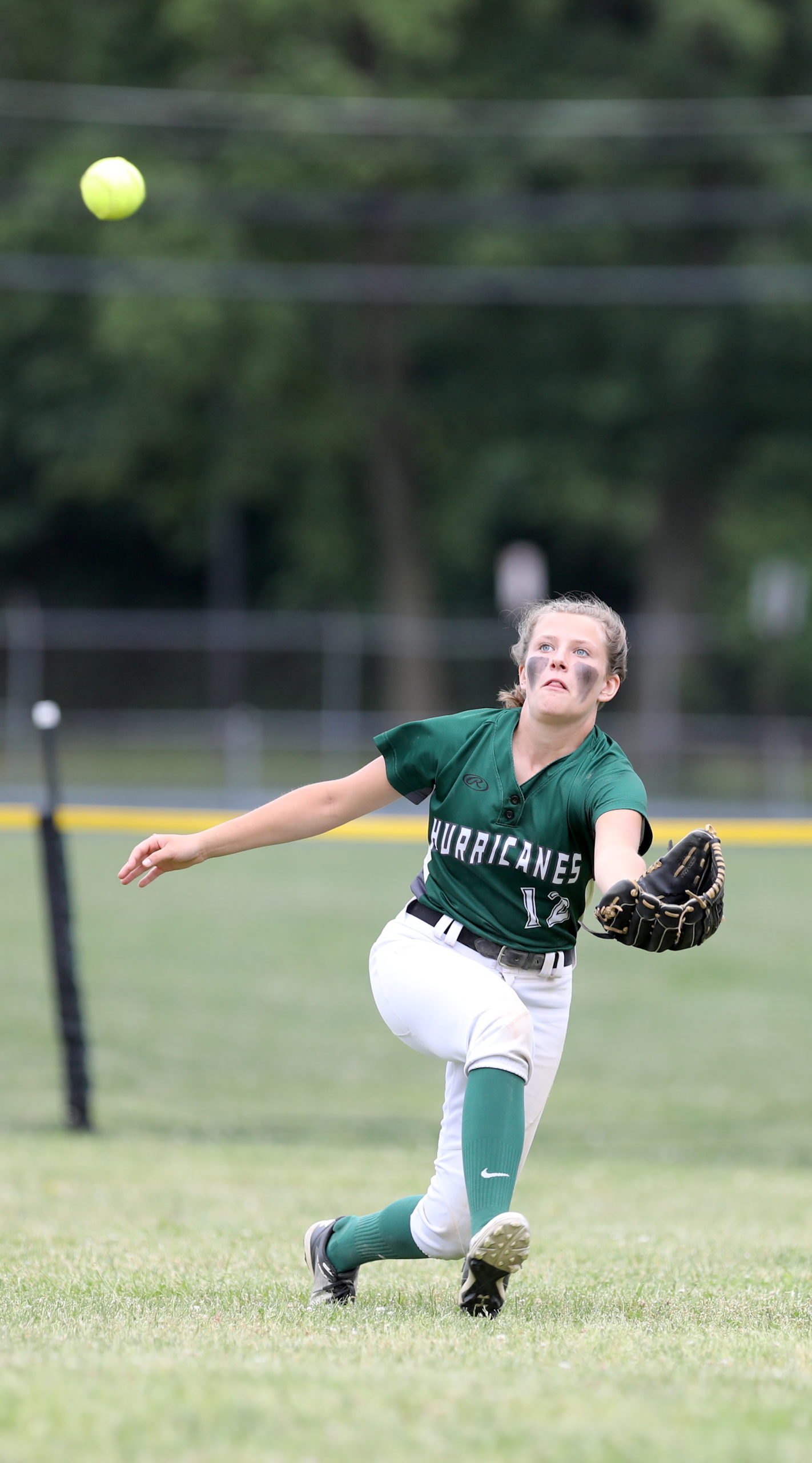 Westhampton Beach Lillie Henthorne races to make a diving grab in the outfield. CHRISTINE HEEREN