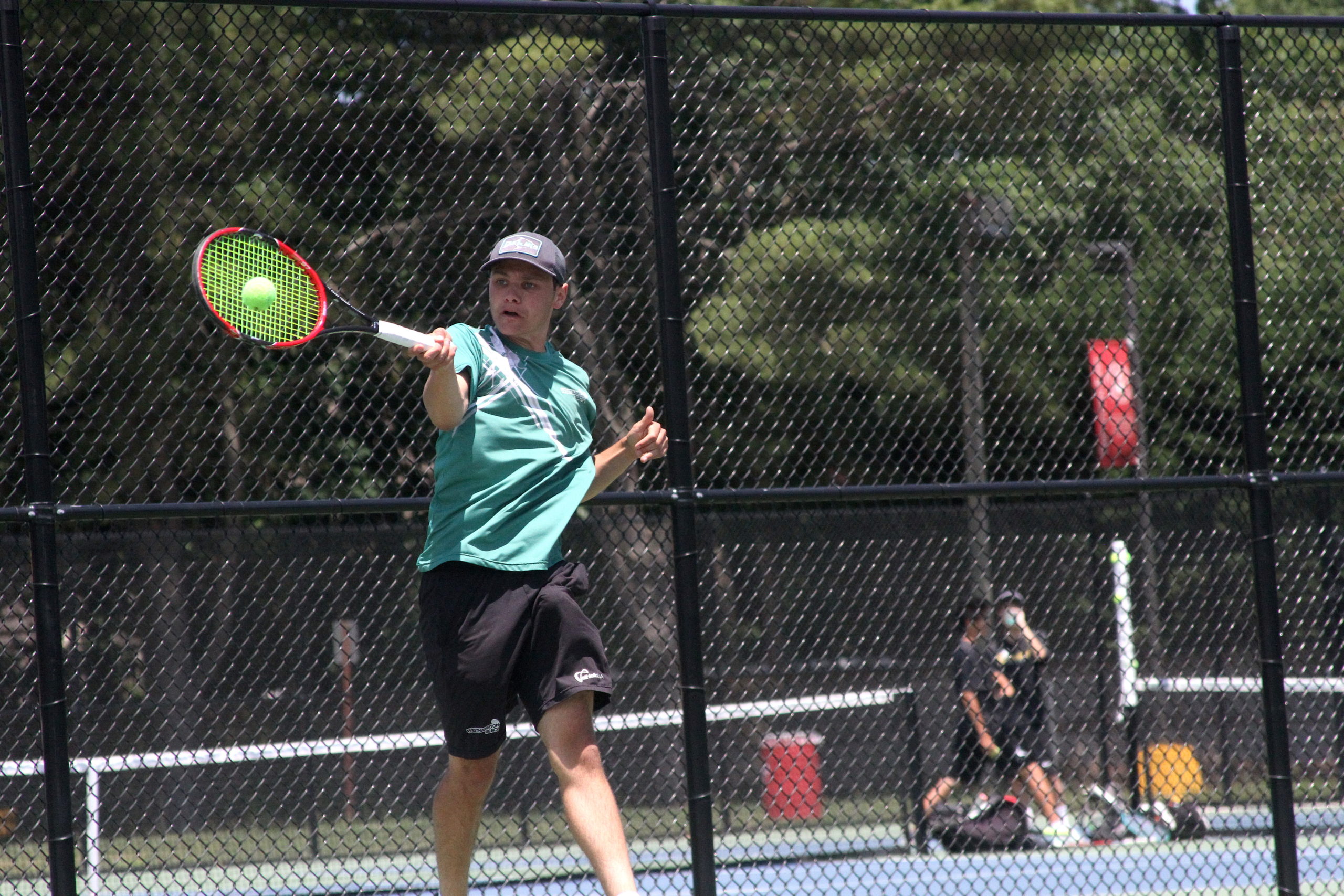 Westhampton Beach senior Josh Kaplan keeps the volley going. DESIRÉE KEEGAN