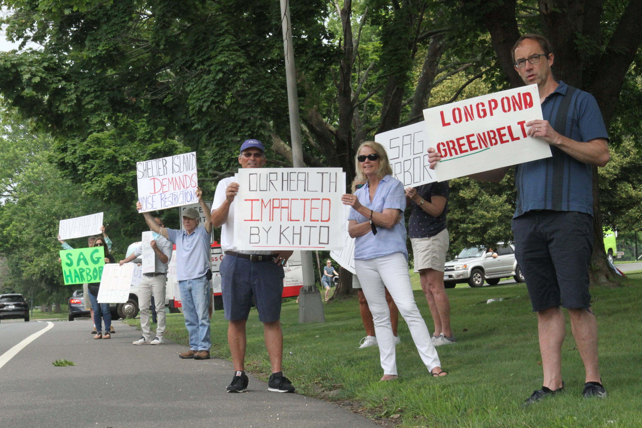Those who would like to see East Hampton Airport closed for good rallied outside Town Hall on Tuesday ahead of a discussion on the airport's future.