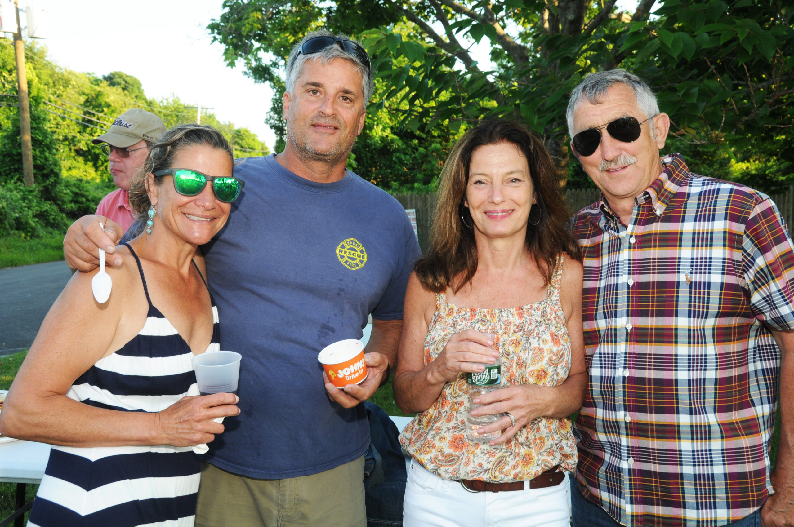 Trish and John De Sousa with Nora and Jim Grimes at the  Montauk Fire Department held its Annual Barbecue on June 28. Members and their Families enjoyed classic picnic food, including burgers, corn on the cob, hot dogs and Dreesen's famous doughnuts. Montauk's John's Drive-In satisfied everyone's sweet tooth with a variety of treats from their ice cream truck.   RICHARD LEWIN