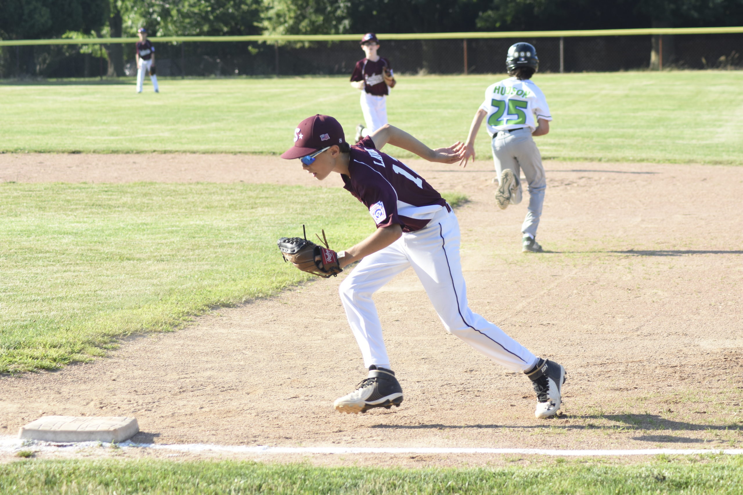 Southampton's Thomas Lavinio fields a ground ball and steps on first for an out.