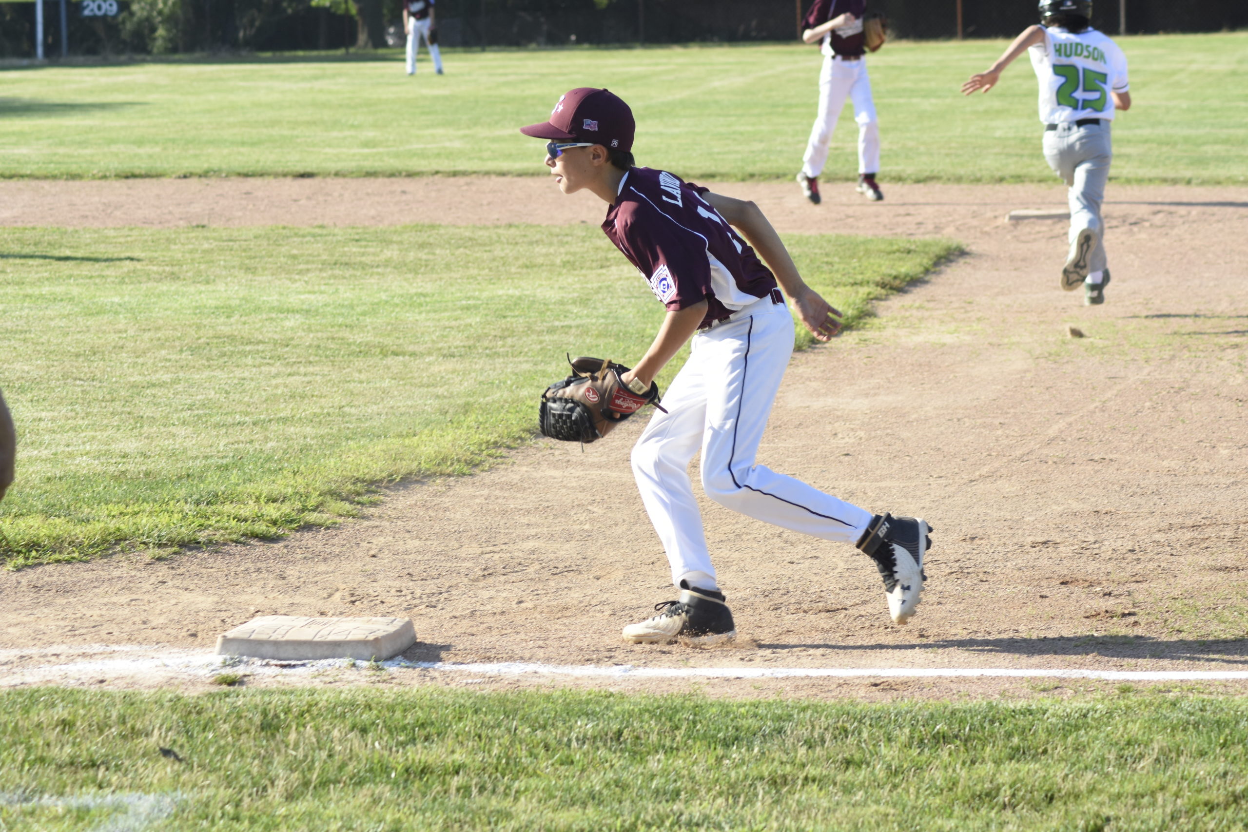 Southampton's Thomas Lavinio fields a ground ball and steps on first for an out.