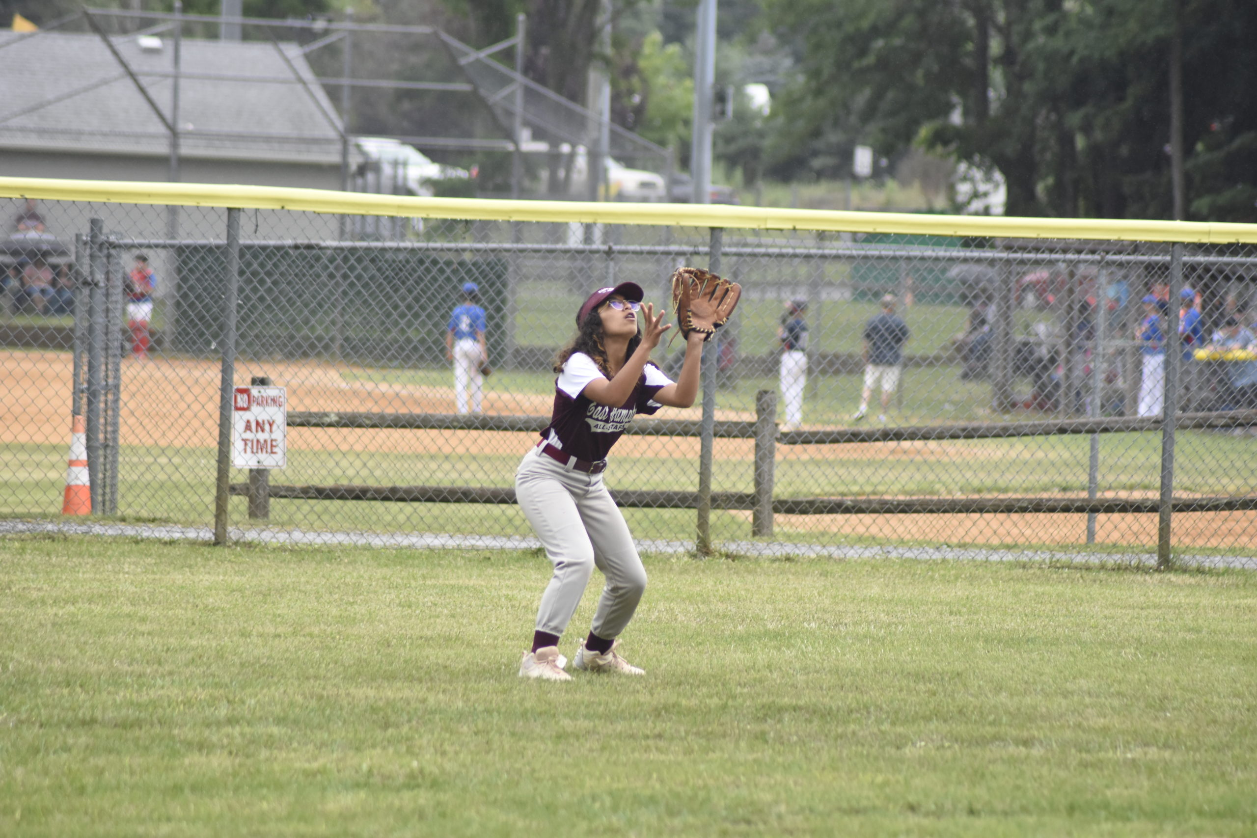 East Hampton centerfielder Emily Hurtado lines up a fly ball and makes the final out to keep North Shore off the scoreboard in the bottom of the first inning.