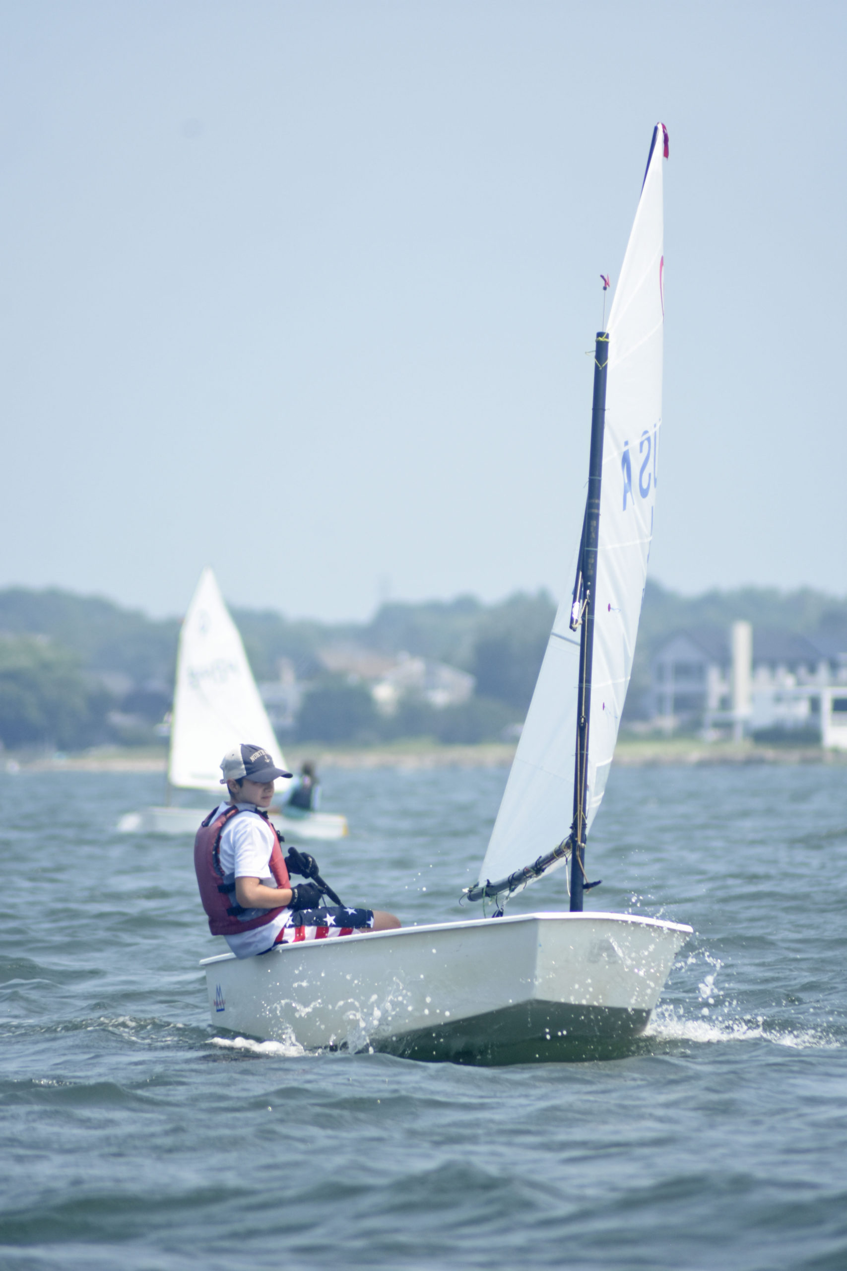 Everett Lehnert of Old Cove Yacht Club in New Suffolk, who went on to win the blue fleet.