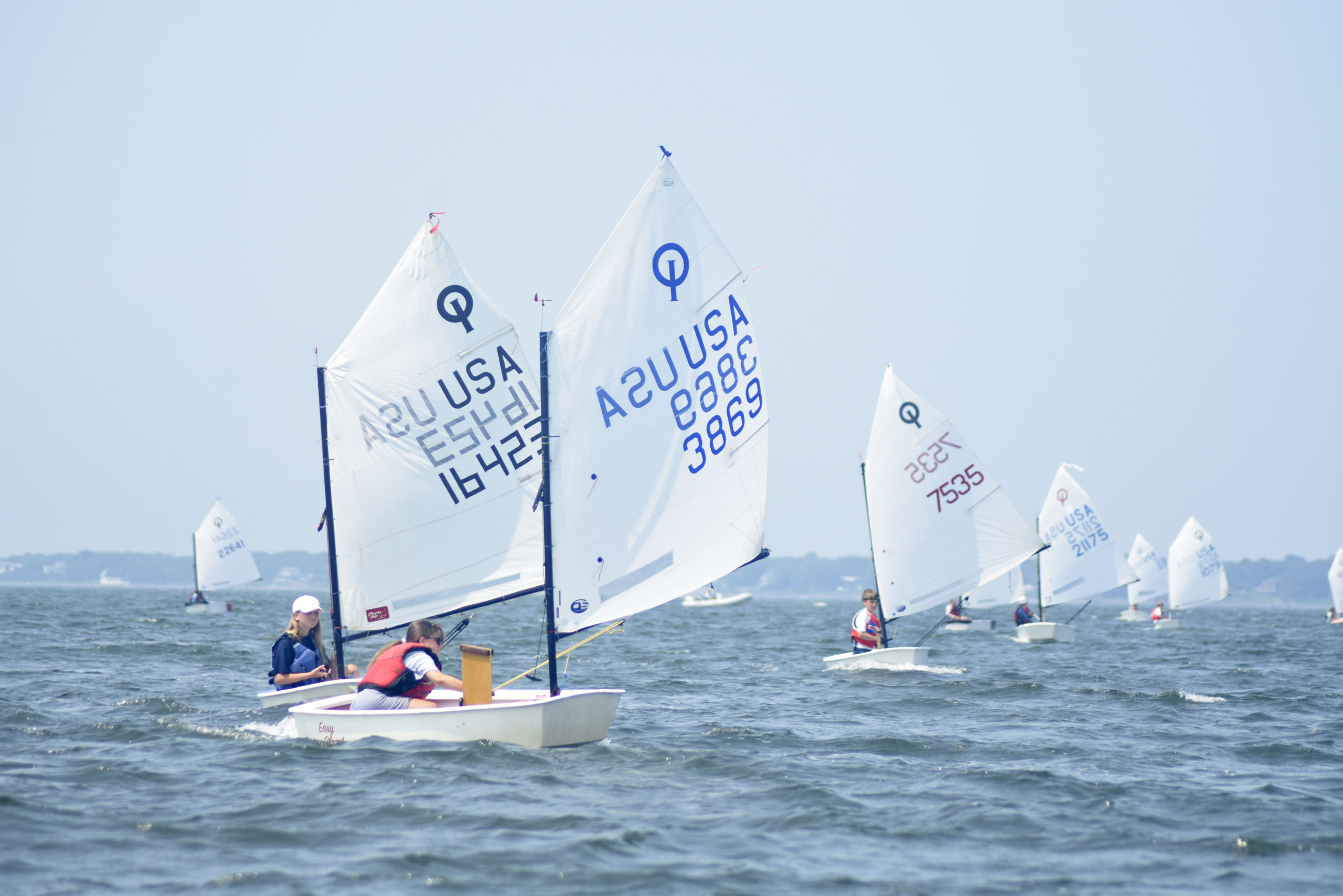 Bridget Spicer of Southold Yacht Club leads a pack of boats.