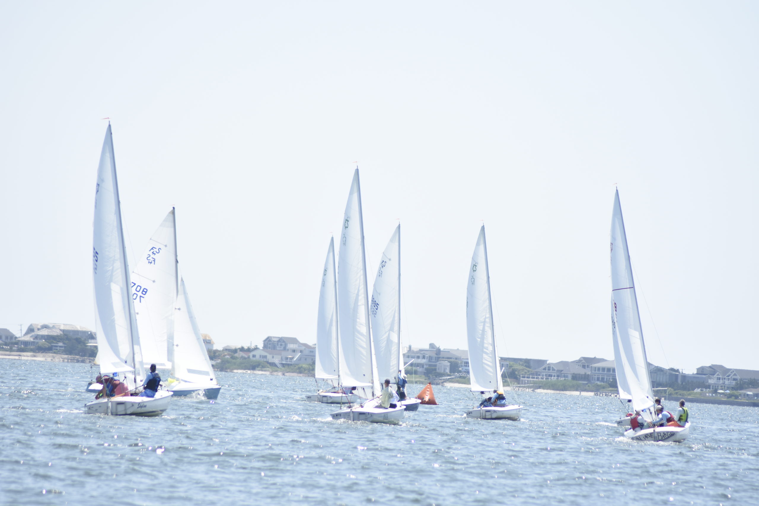 A fleet of flying scots head toward the first marker.