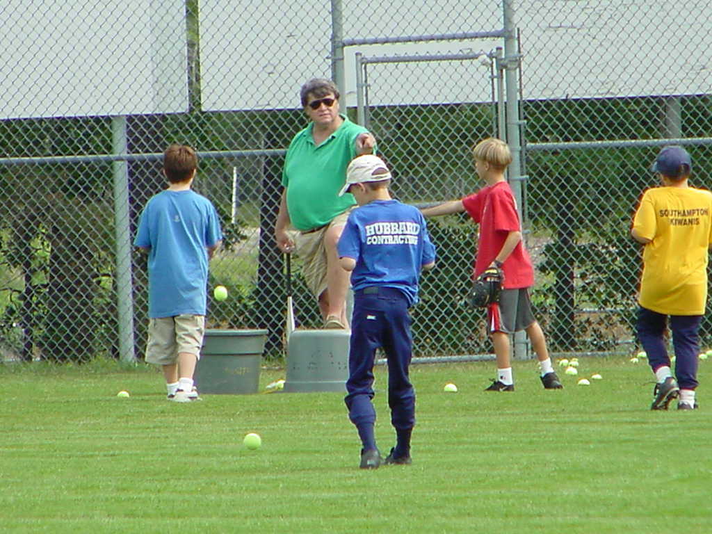 Rob Nelson's brother, Harry Nelson, leading players at the Southampton Town Baseball Camp.