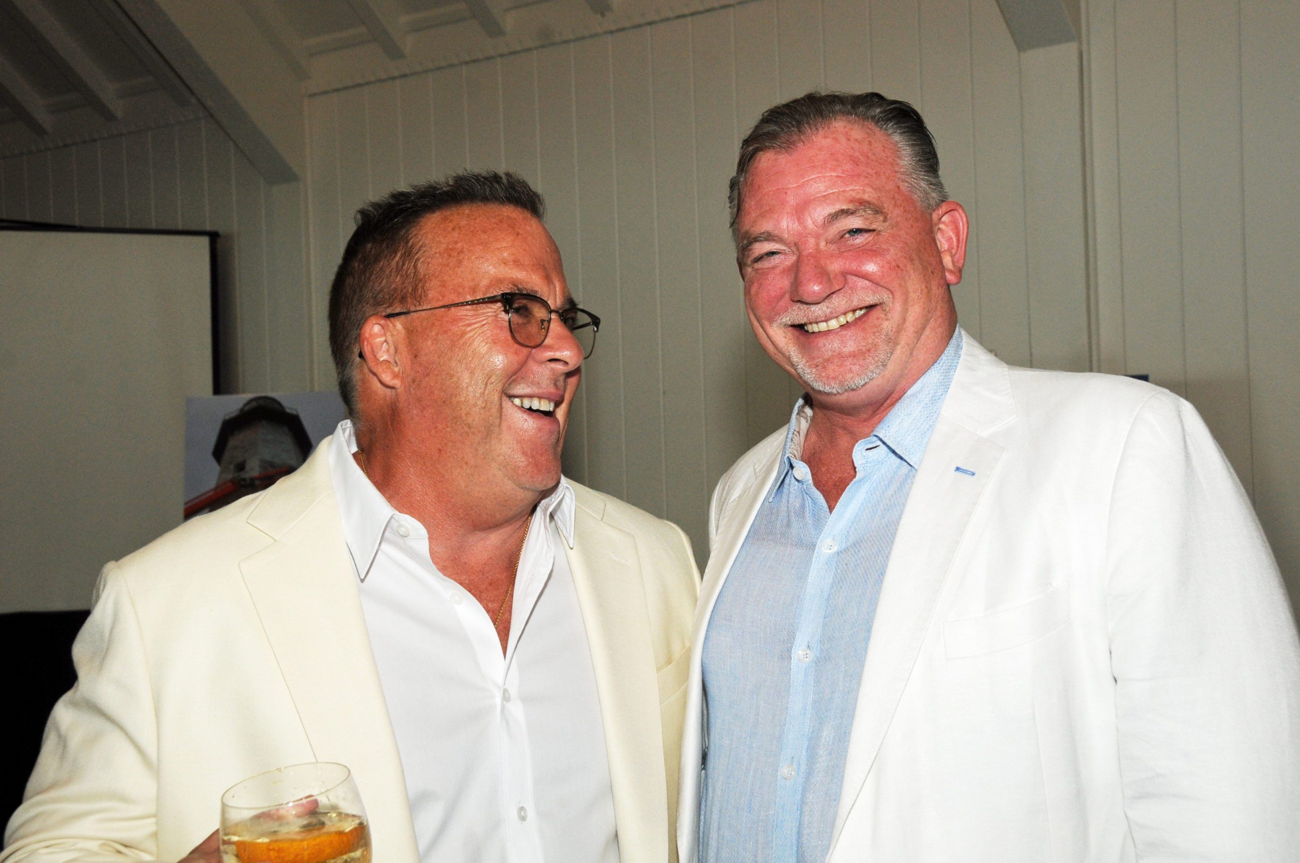 Robert McBride and Kevin O'Connor at the Montauk Historical Society's cocktail party on July 14 to launch a public capital campaign for the Montauk Point Lighthouse restoration.  Work on restoring the tower began in 2019, and is scheduled to be completed by next year.     RICHARD LEWIN