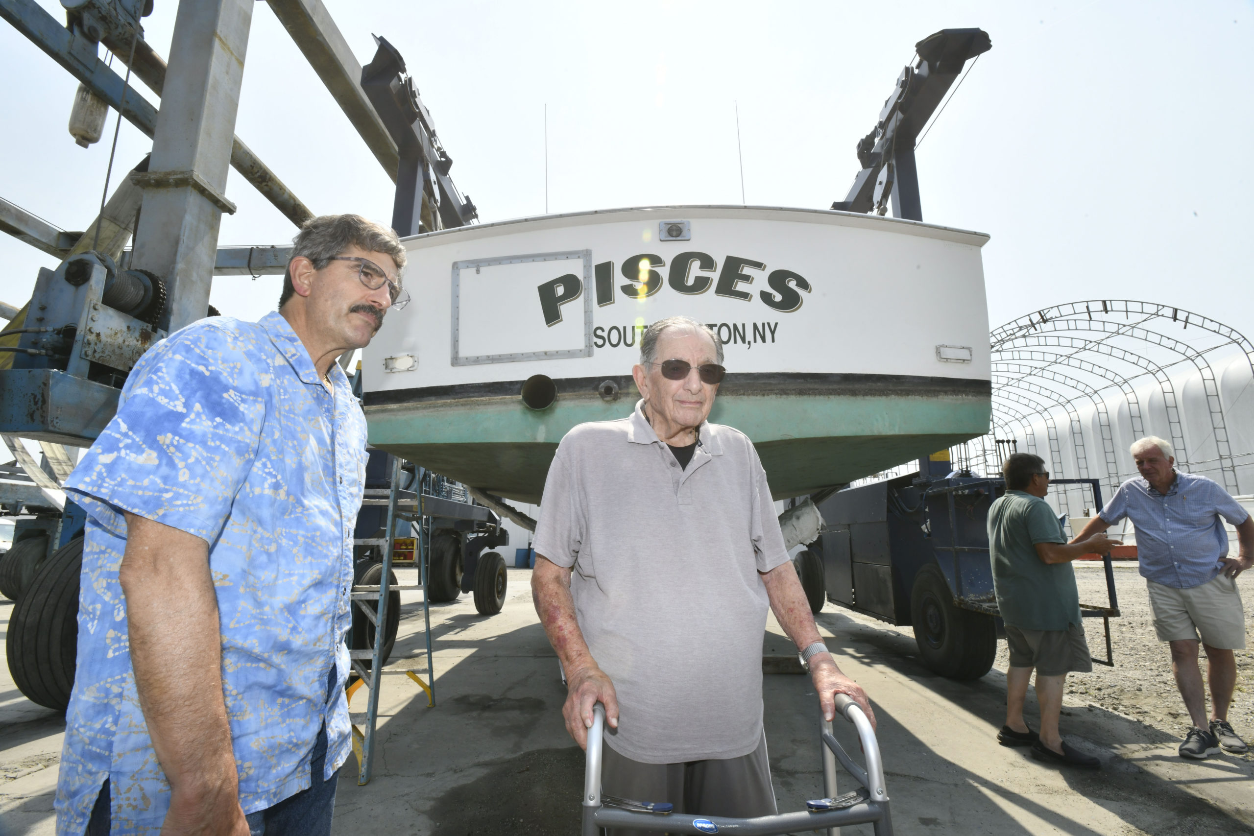 Al and Anthony Rispoli with the Pisces.   DANA SHAW