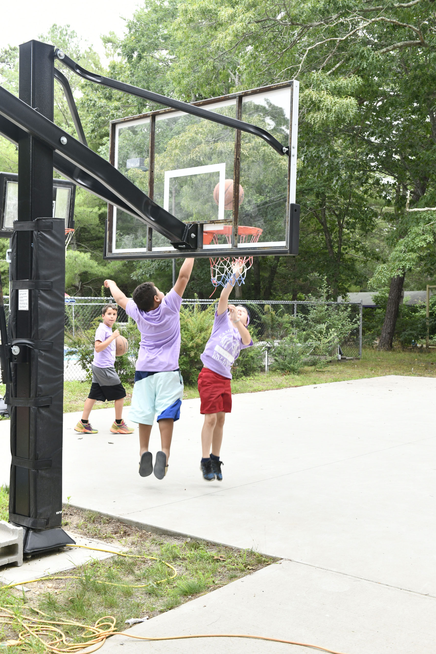 Campers play basketball  at Camp Good Grief.  DANA SHAW