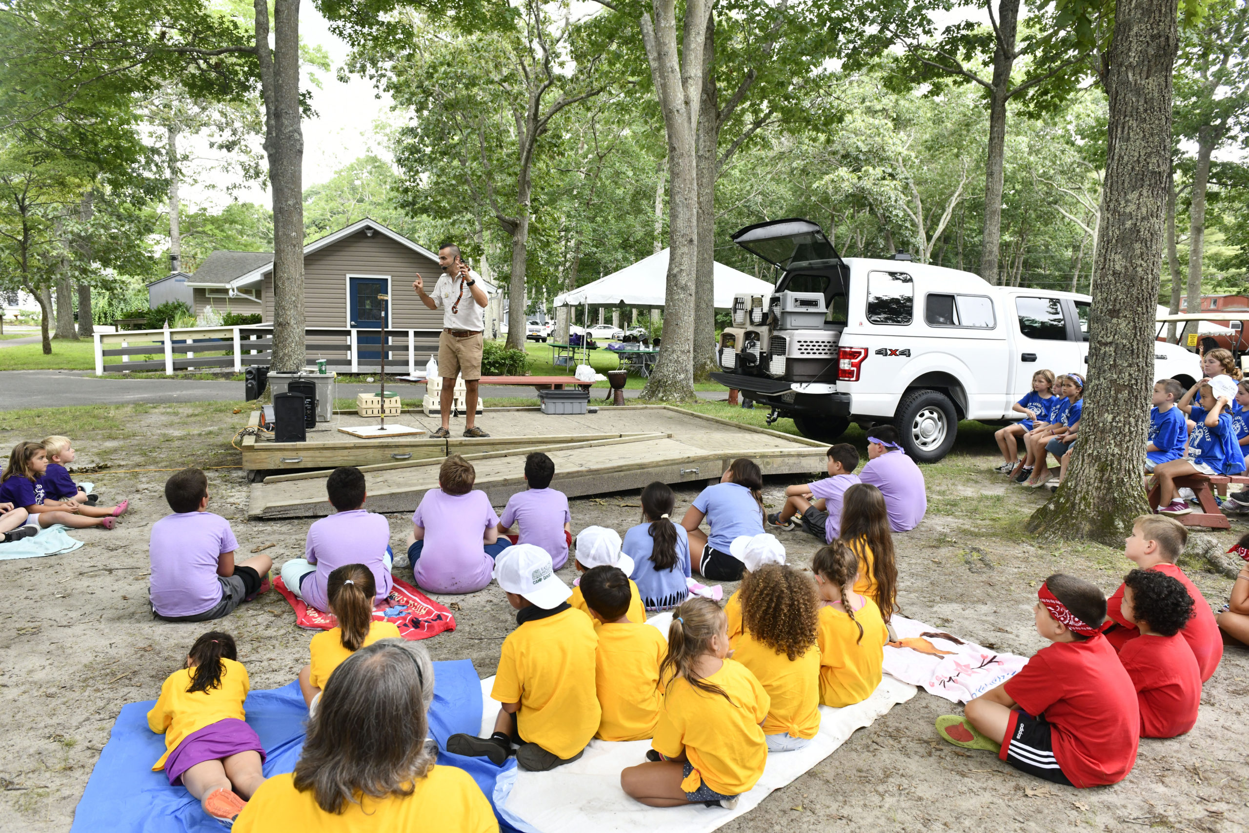 Campers at Camp Good Grief enjoy a visit from Nature Nick.    DANA SHAW