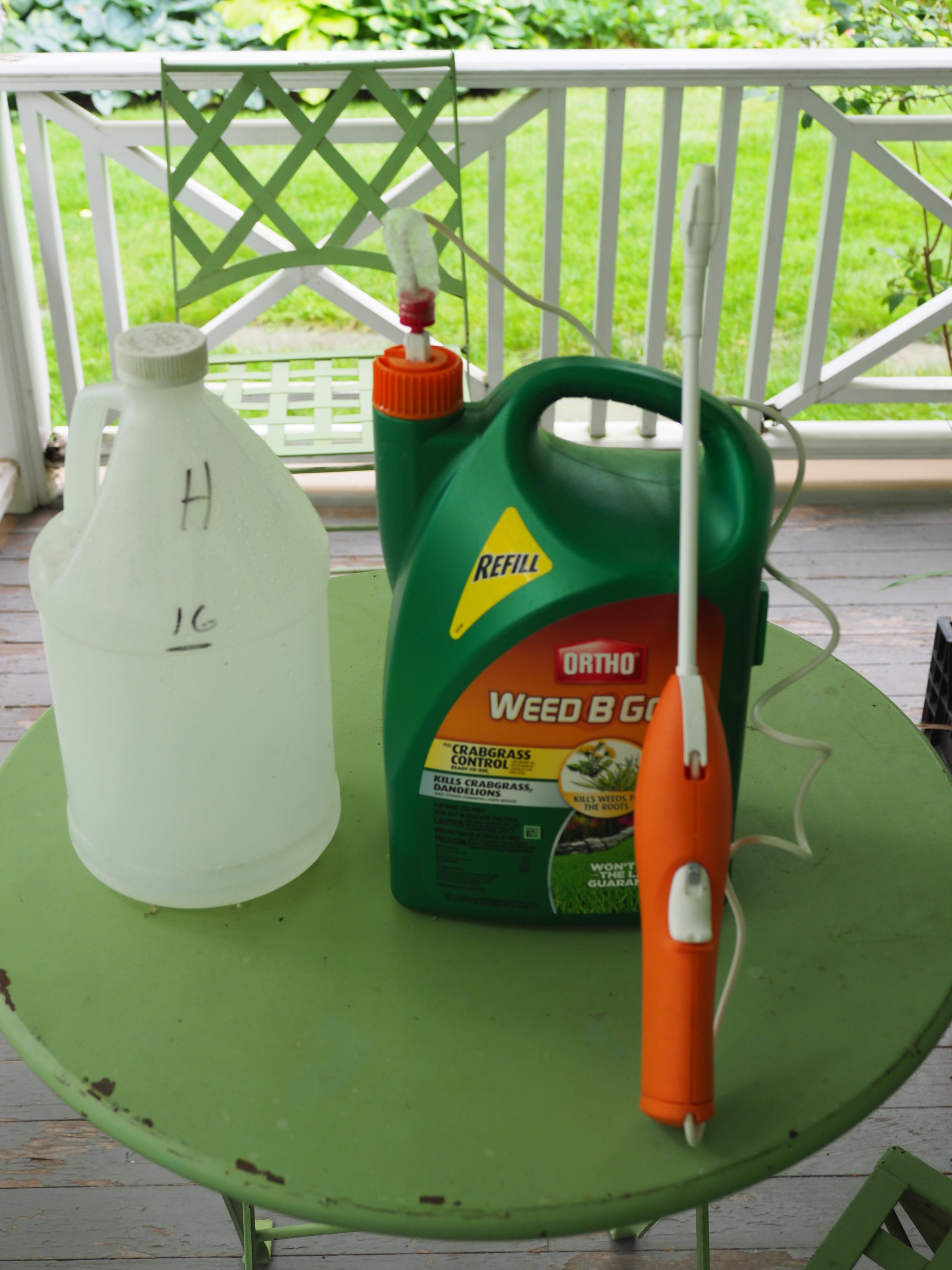 The spray wand and hose from this Ortho product can be removed from the gallon jug and simply attached to another jug so it can be used as a spot sprayer.  The spray wand runs on four AAA batteries, which can be replaced.  Note the 