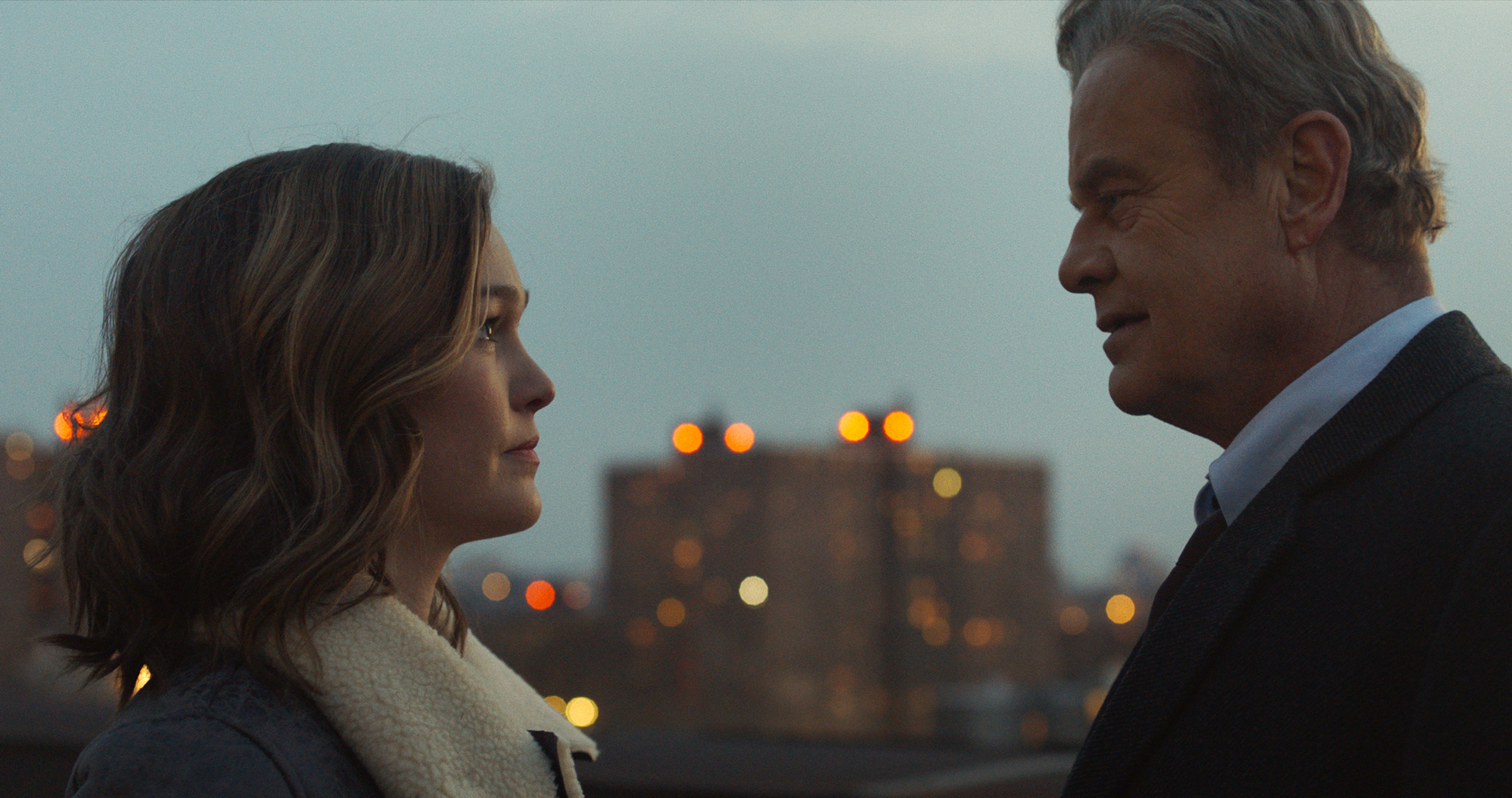 Kelsey Grammer and Julia Stiles share a moment.