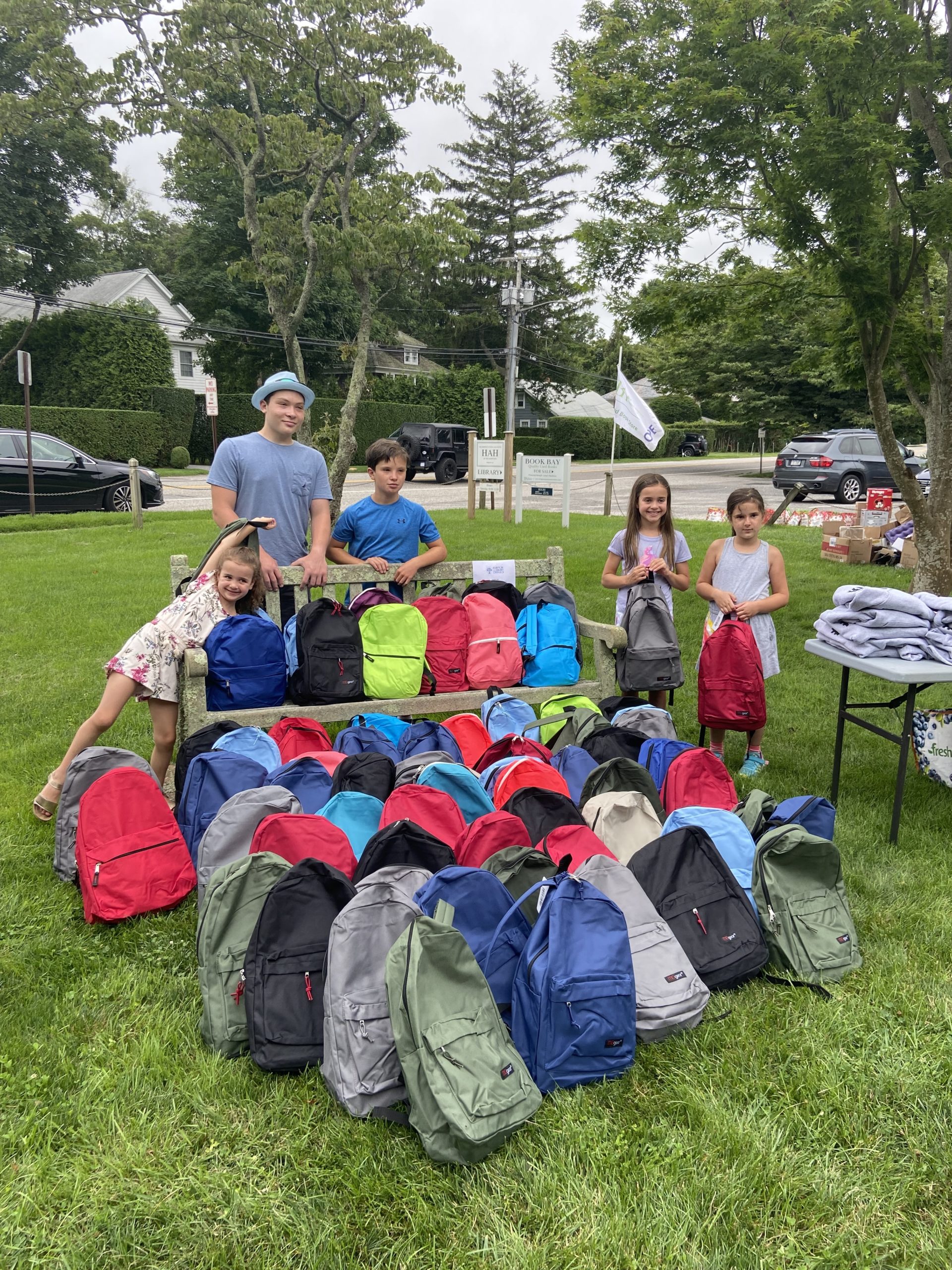 Young volunteers showed up to pack backpacks full of summer essentials for the local community.
