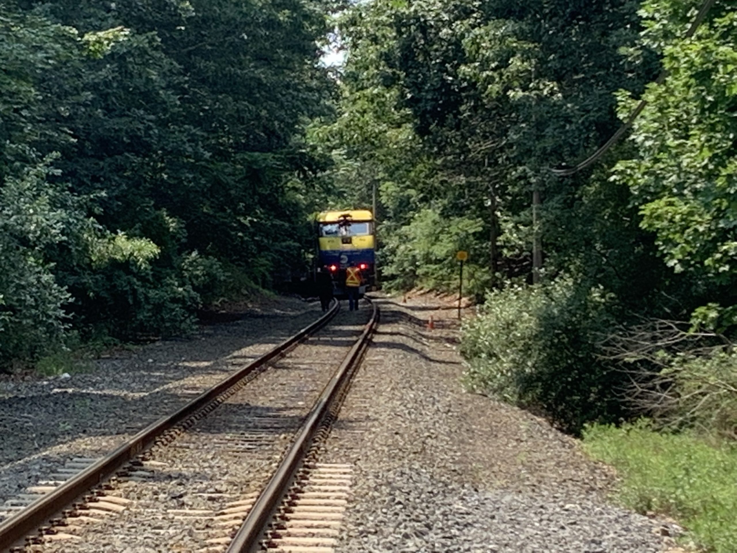 The train waits on the track during the accident investigation. Stephen J. Kotz