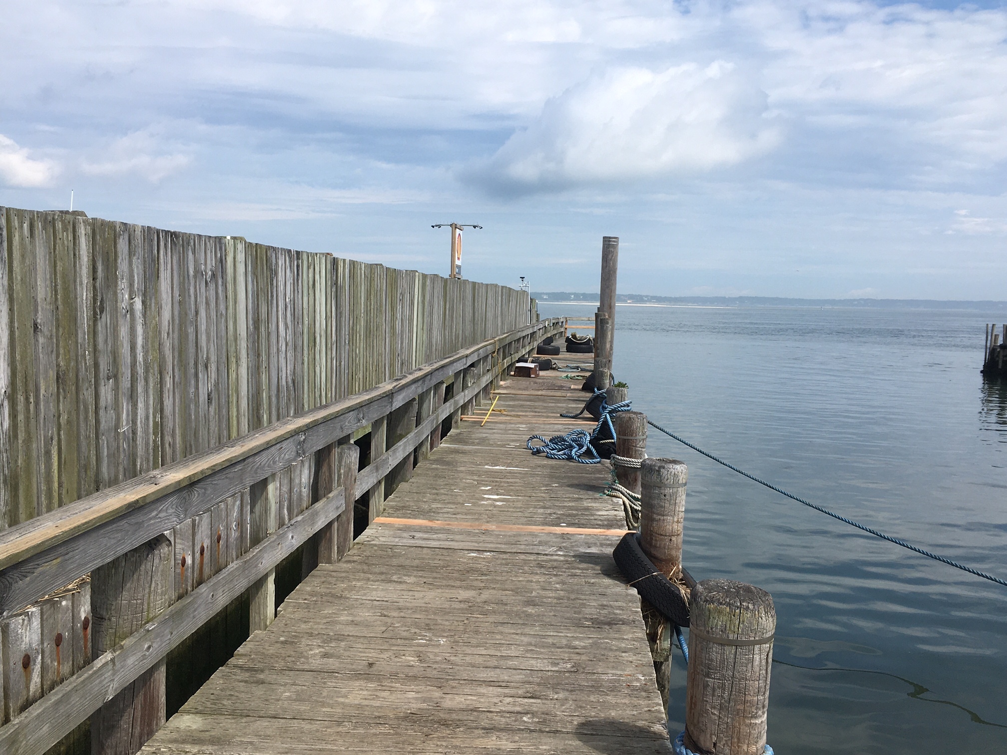 At the commercial dock in Hampton Bays, Trustees made emergency repairs to shore up a collapsed section.