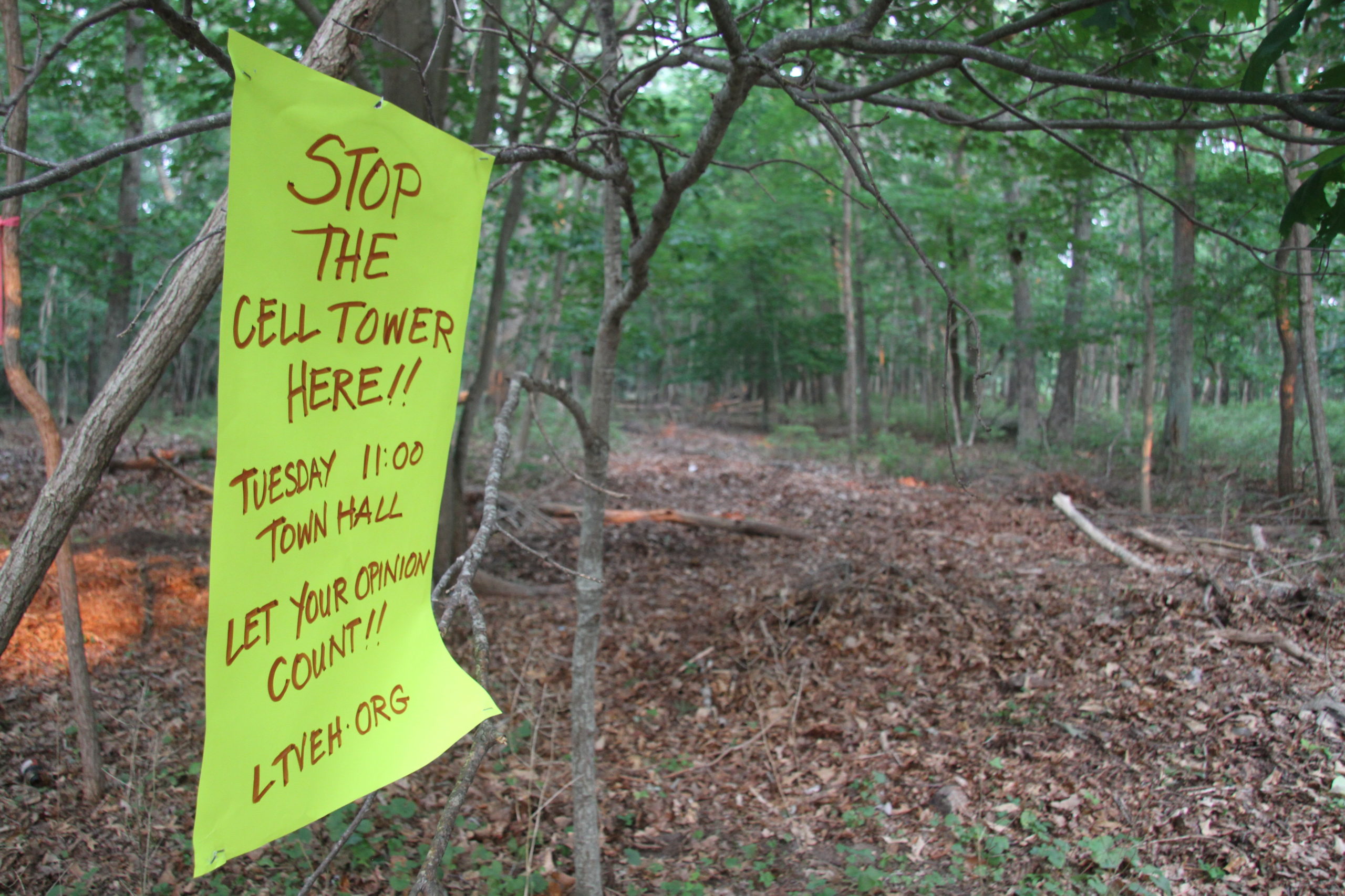 Residents rallied neighbors to come to the Town Board meeting on Tuesday to oppose the proposal to use the property commonly called 
