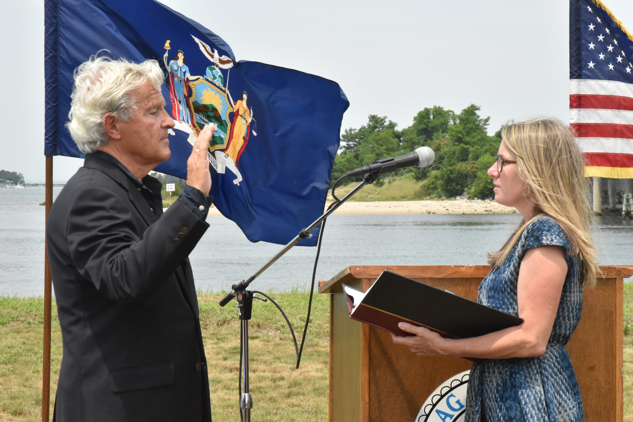 Sag Harbor Village Mayor James L. Larocca is sworn in by Village Clerk Beth Kamper. STEPHEN J. KOTZ