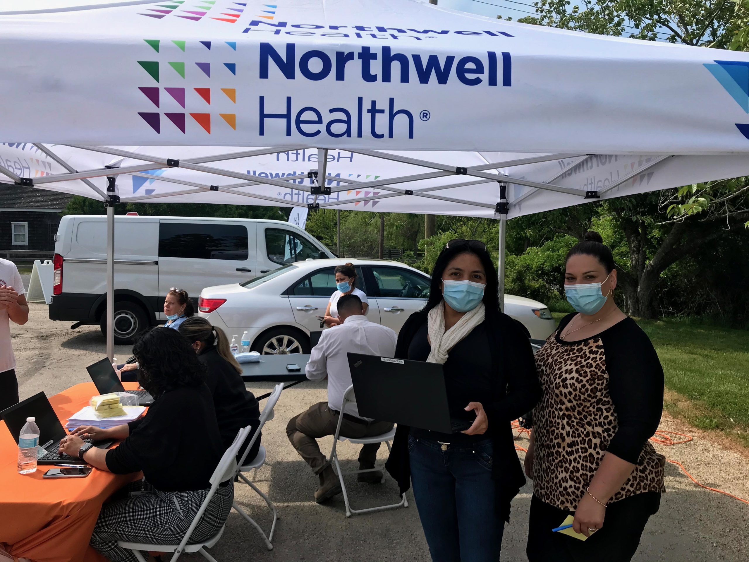 Erika Padilla, left, and Wally Ramirez of OLA of Eastern Long Island, helped organize a vaccination POD with Northwell Health at the Springs Food Pantry earlier this year in an effort to reach unvaccinated individuals in the Latino immigrant community.