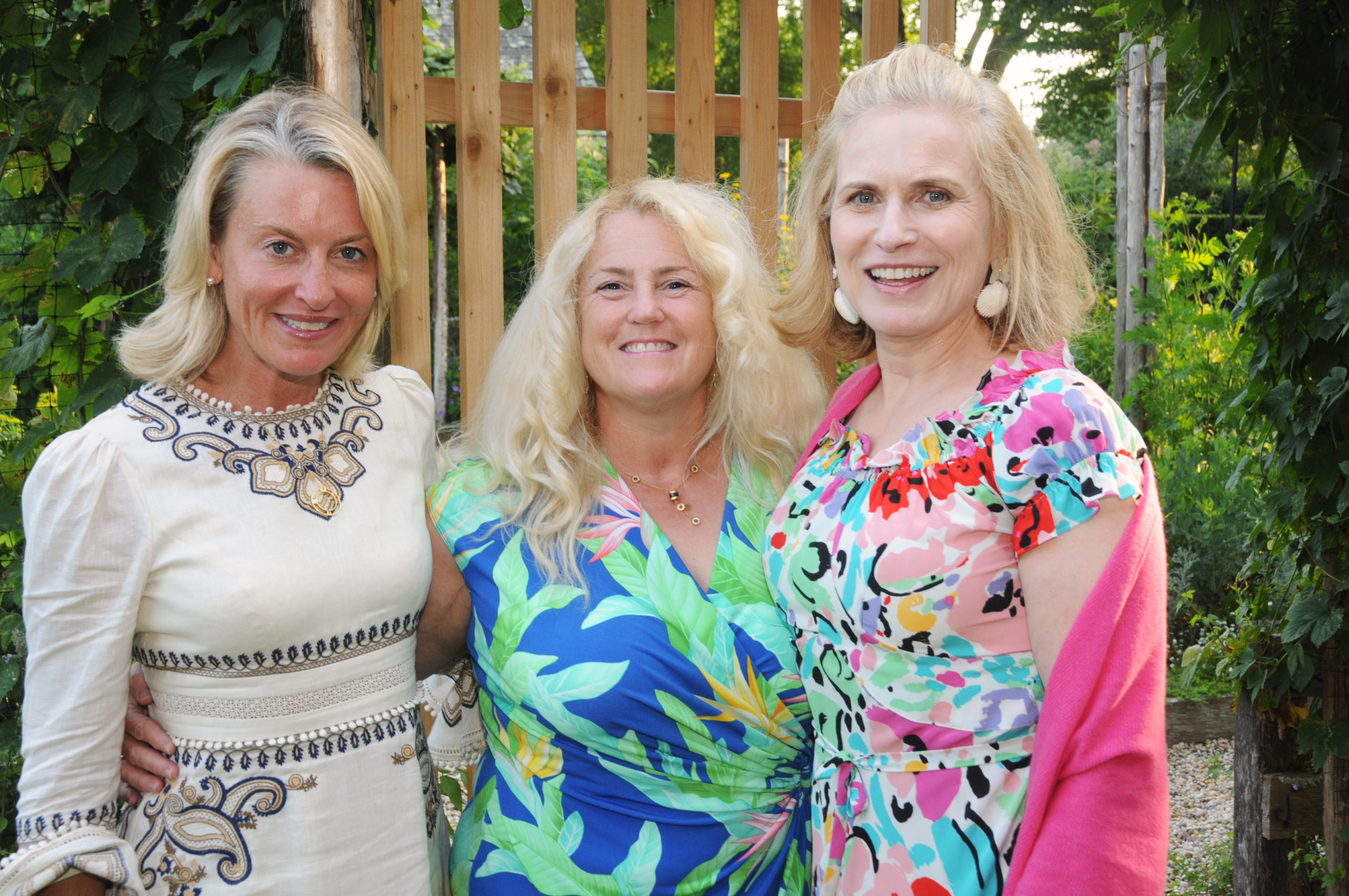 Tina Teel, Lynda Packard and Jennifer Borg at the East Hampton Historical Society's preview benefit cocktail party for the 2021 East Hampton Antiques & Design Show on Friday evening on the grounds of Mulford Farm. RICHARD LEWIN