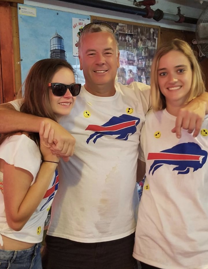 Jennifer, Terry and Kelly Beglane wearing Buffalo Bills shirts at Boardy Barn in July 2017.