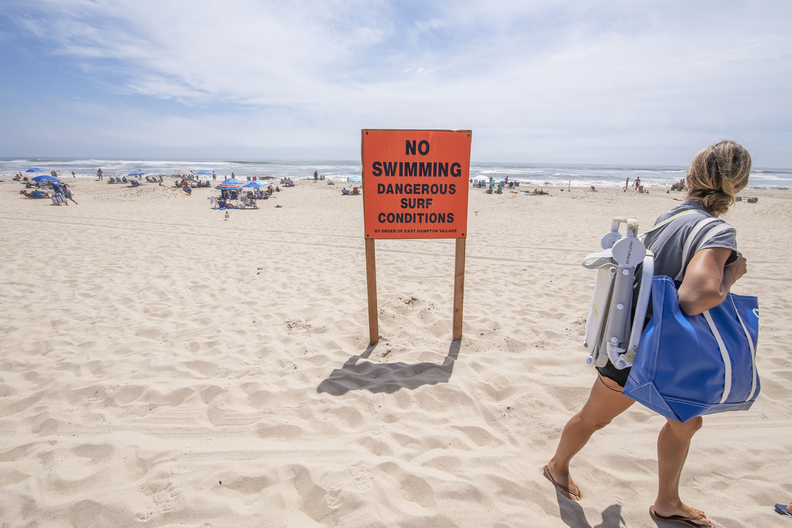 East Hampton Village lifeguards at Main Beach closed the beach to swimming at 11:00 a.m. in preparation for Hurricane Henri on Saturday.  MICHAEL HELLER