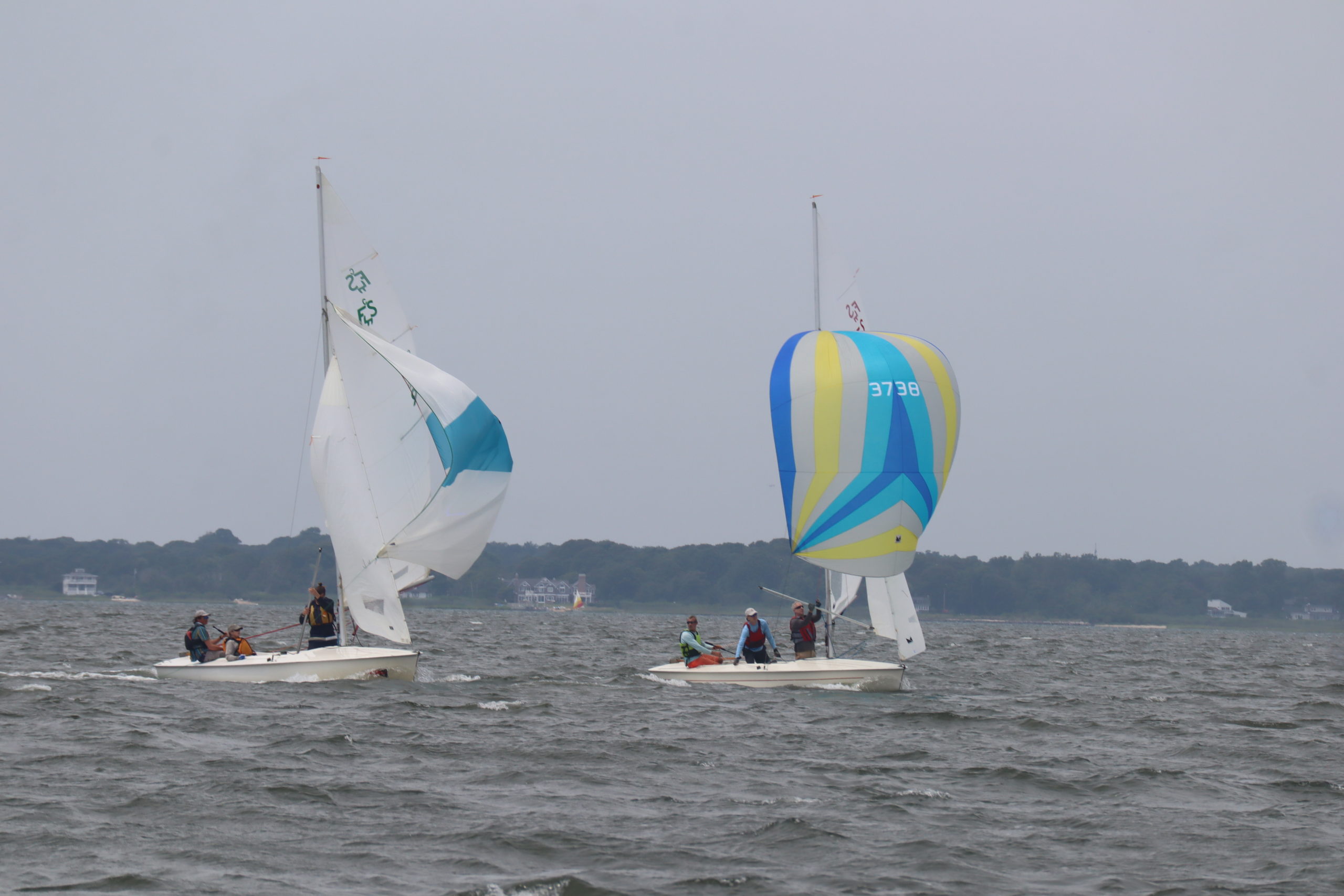 The flying scots release their spinnakers.