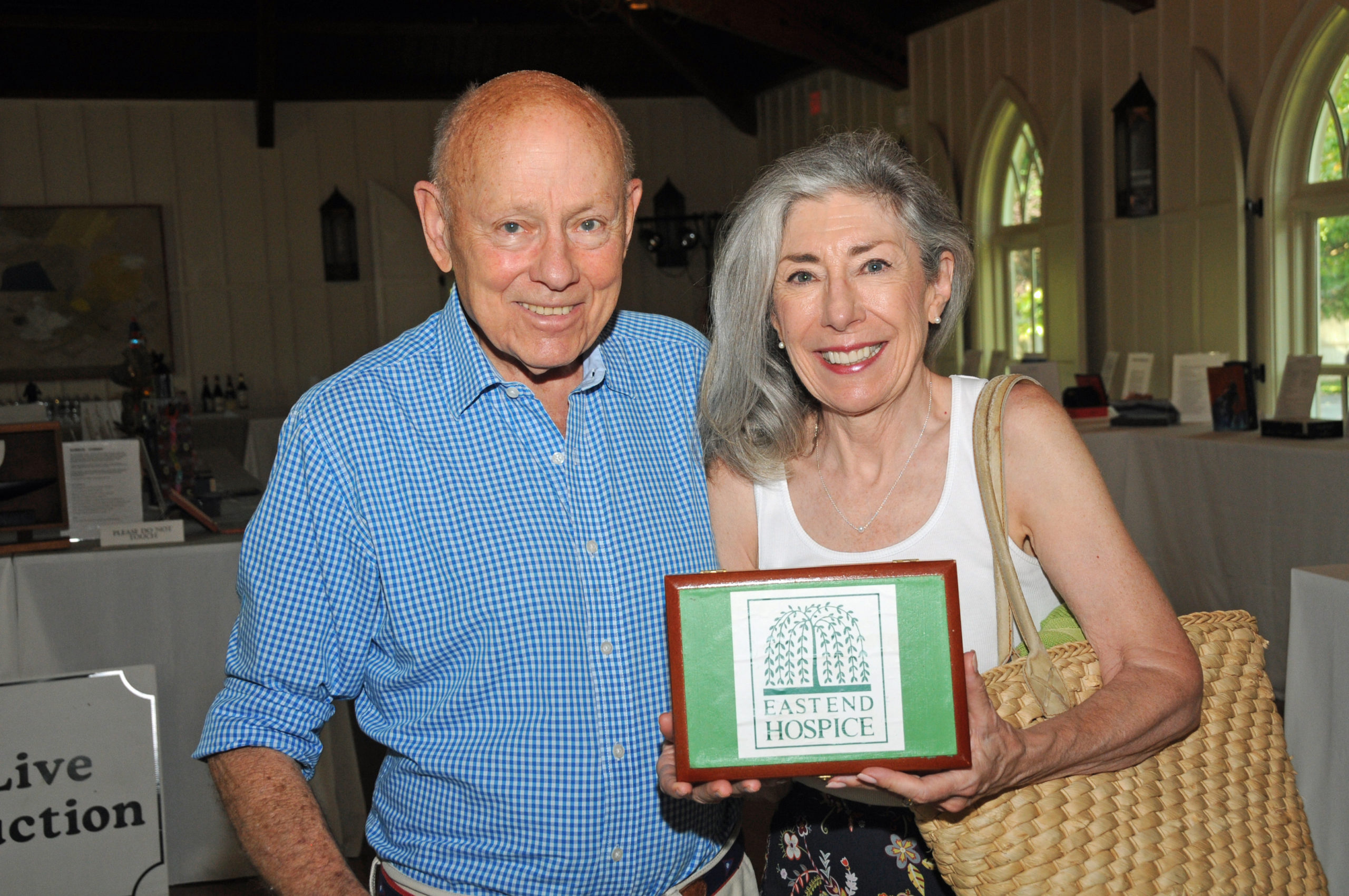 Ted David and Louise Merriman at the East End Hospice Art Box Auction preview on Thursday evening at at Hoie Hall in St. Luke's Episcopal Church in East Hampton. More than 80 decorated boxes were auctioned on Saturday to benefit East End Hospice.    RICHARD LEWIN