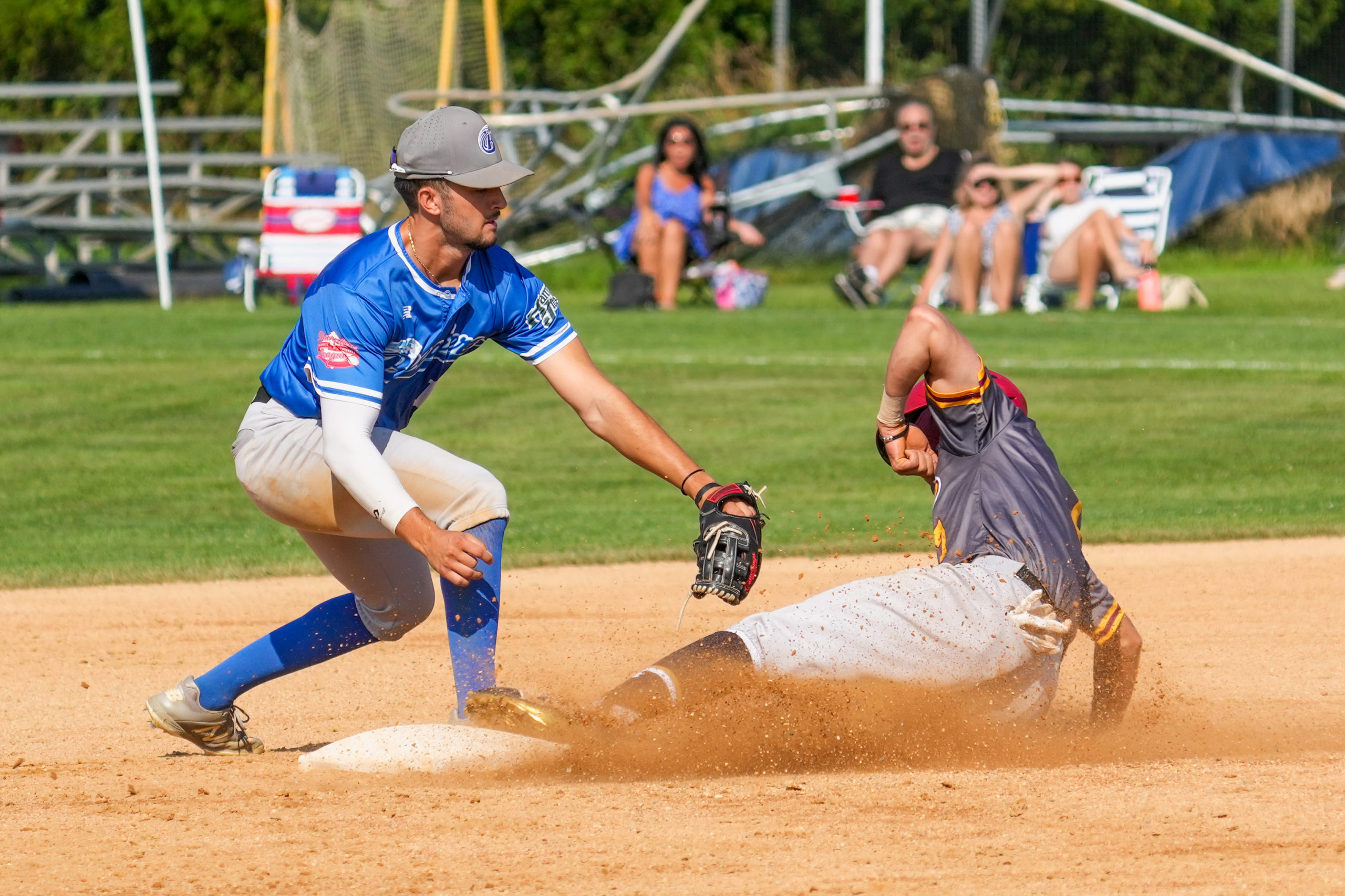 Breakers second baseman Marco Ali (Marist) applies a late tag to Riverhead's Brian Morrell.