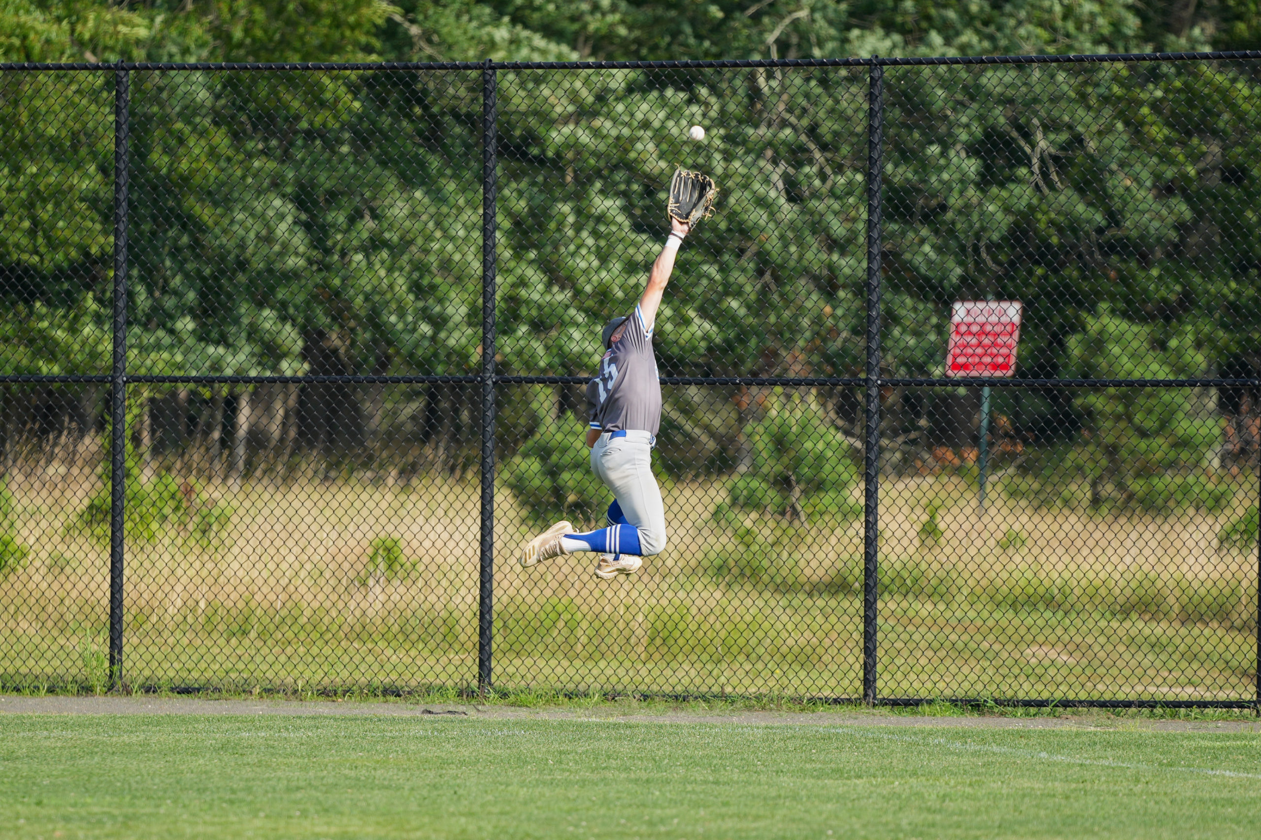 Southampton's Parker Stinson (Indiana State) makes an acrobatic play in right field.