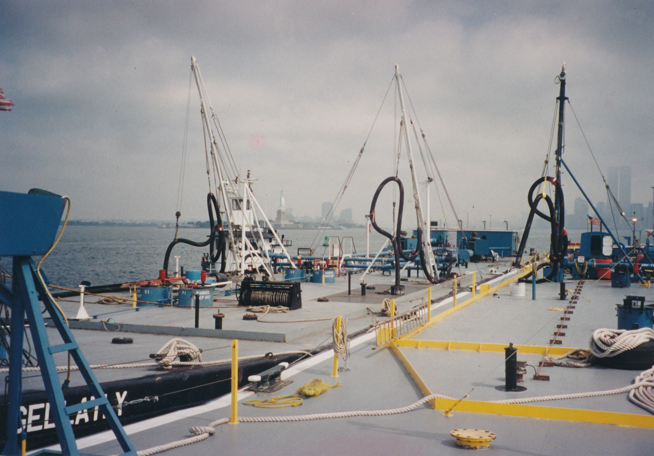 On the mooring the day before, with the Twin Towers visible in the background, right.