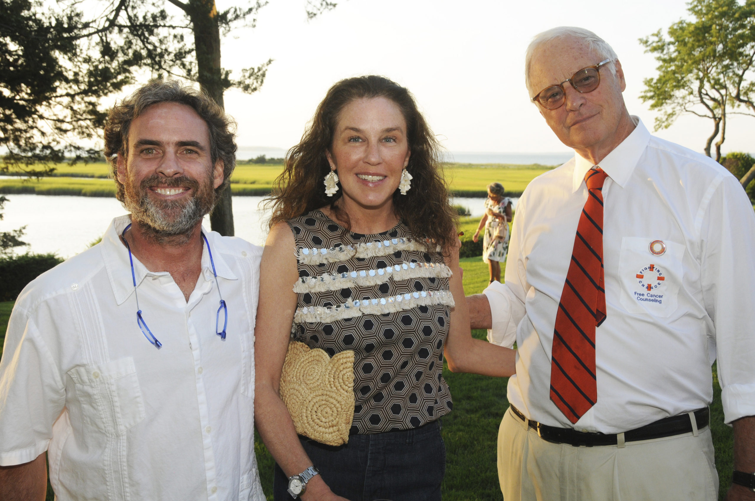 Geoffrey and, Marcie Lynch with Fighting Chance Founder Duncan Darrow at the cocktail Reception benefiting Fighting Chance Free Cancer Counseling on Friday at the home of the Corcoran Group's Tim Davis, and his wife Susan.   RICHARD LEWIN
