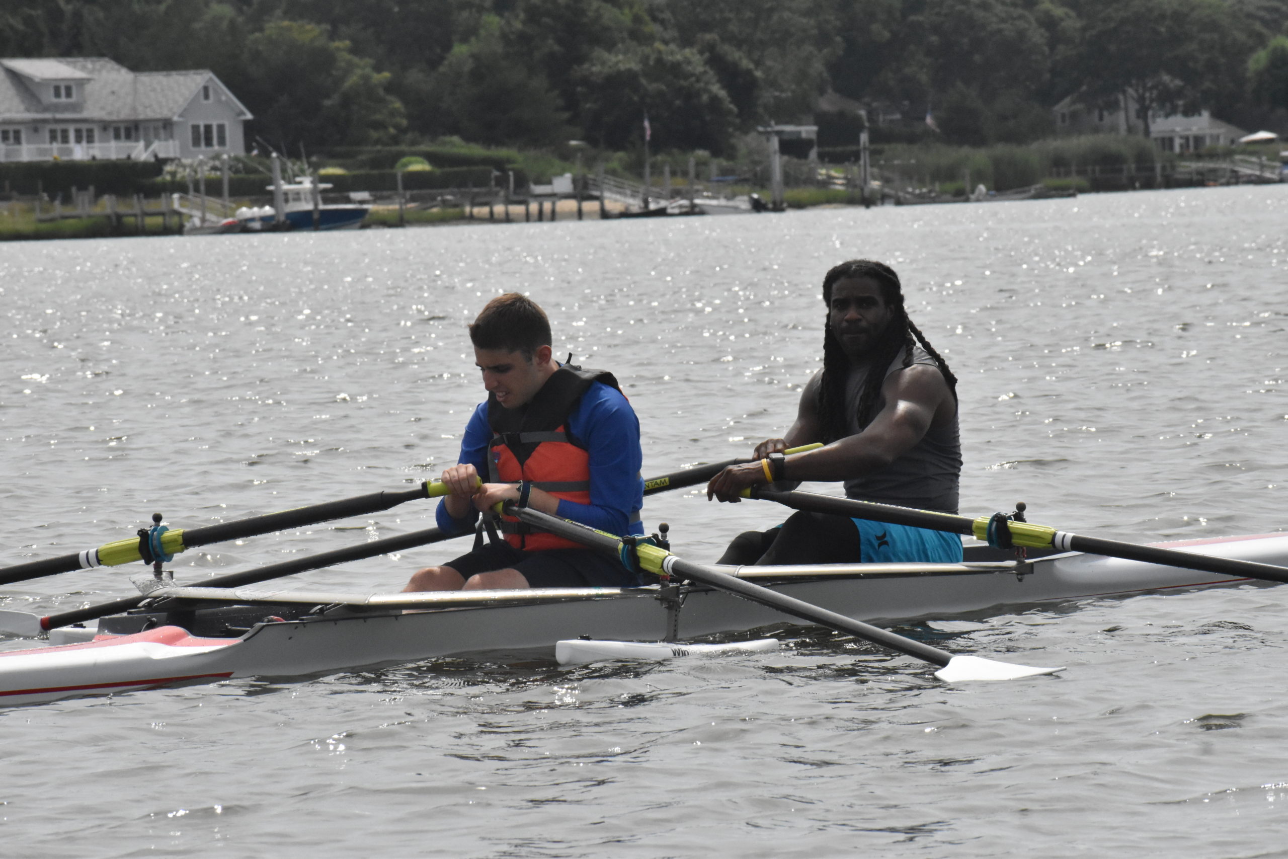 Michael Kessaris, left, and Claude Saturnin practice in Sag Harbor Cove. STEPHEN J. KOTZ