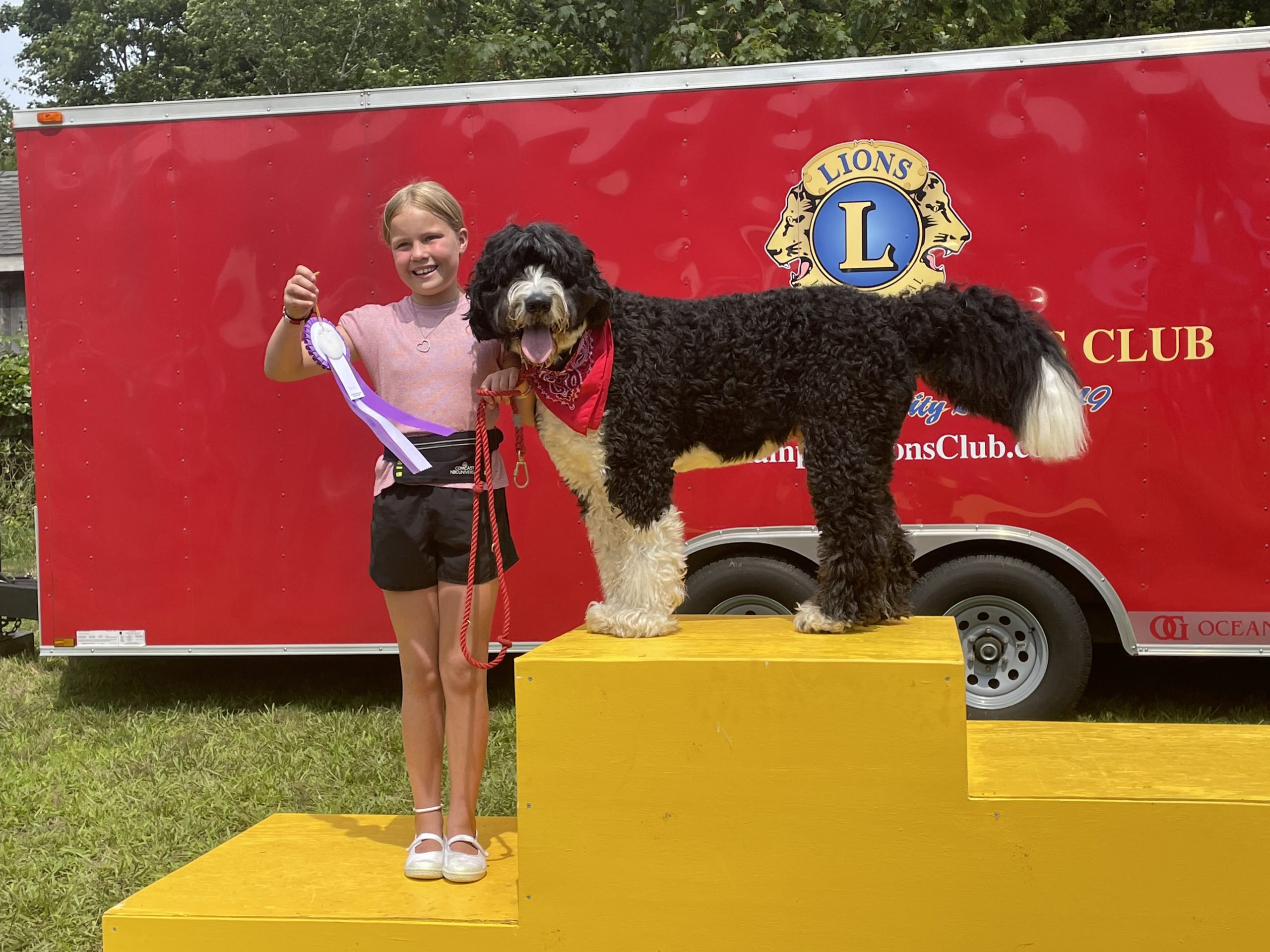 Wesley Whitworth, 9, and her dog Bogart, a 4 year-old Bernedoodle, who was named Best in Show at the 3rd Annual Hamptons Dog Show on Saturday. The event was hosted by the East Hampton Lions Club, and held open the grounds of the American Legion in Amagansett.
