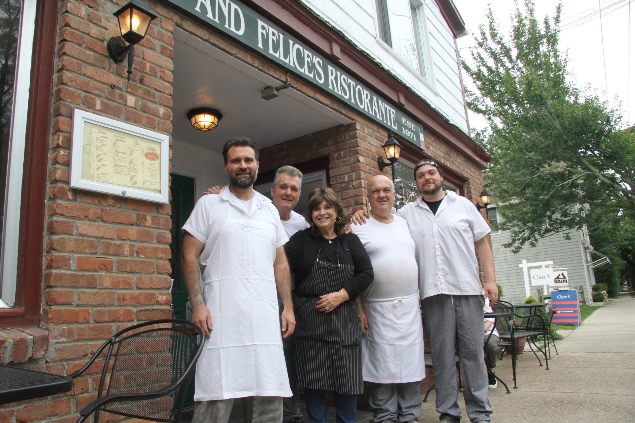 Anthony, Nado and Alda Stipanov, left, and Tony and Joe Lupo, have sold Astro's Pizza and Felice's Ristorante in Amagansett after 50 years in business. The new owners are expected to continue selling pizza and adding an ice cream parlor.  Michael Wright