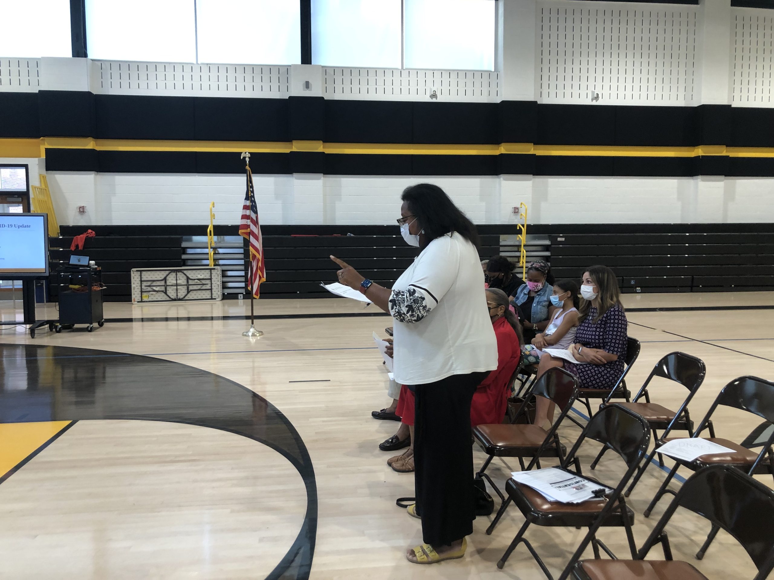 Denise Merchant (in white) and Larry Street (in yellow) from the local chapter of the NAACP. CAILN RILEY